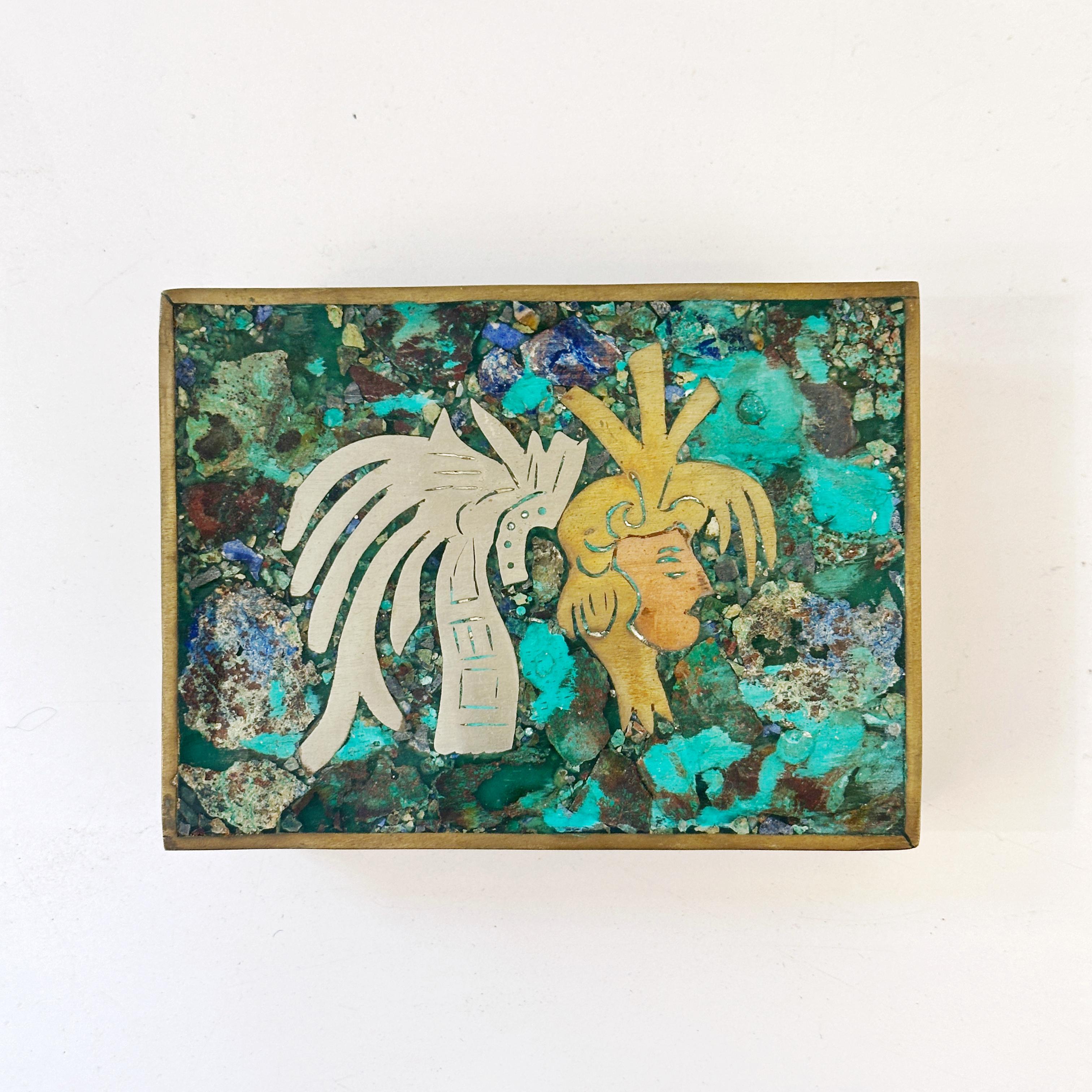 Taxco Mexico Brass and Azurite Malachite Small Hinged Box with Rosewood ca 1960s

Superb handwrought circa 1960s mixed metals - silver, copper and brass - inlay box by a skilled silversmith from Taxco, Mexico. An abstract design featuring a warrior