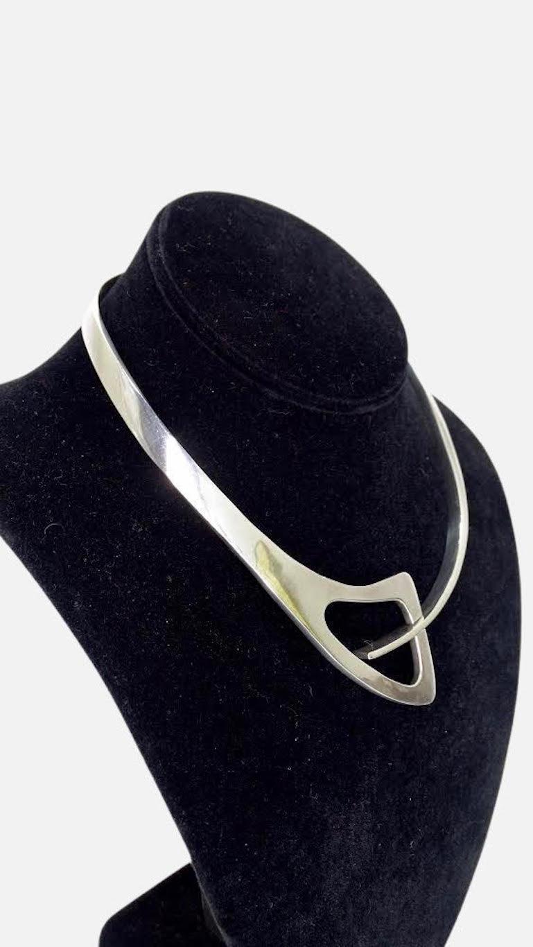 Beautiful late 20th century collar choker crafted from Sterling Silver into a unique modernist design. Stamp appears to say 925 Sterling Taxco Mexico. Timeless and truly one of a kind, this choker will pair perfectly with your favorite Hermes