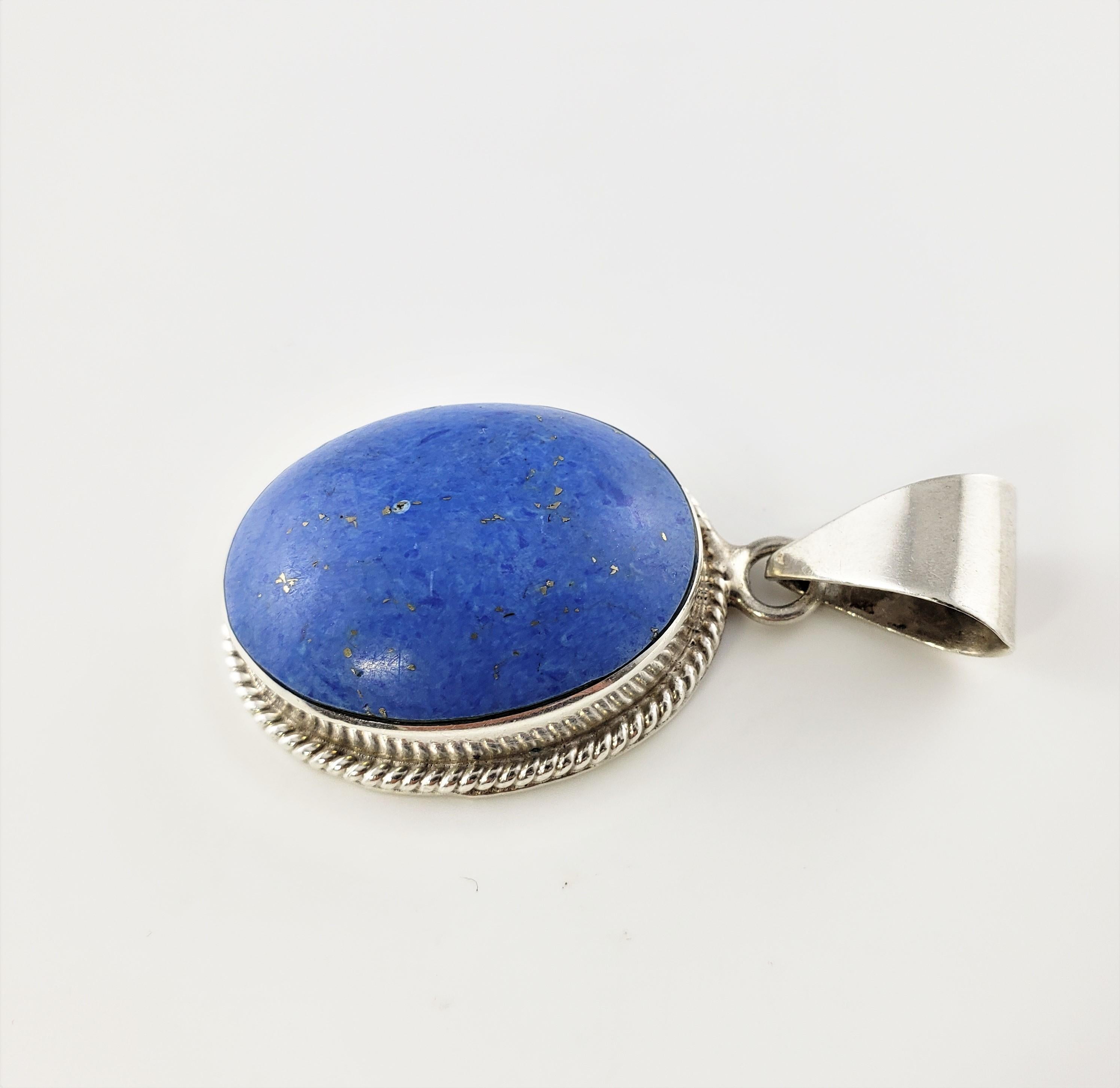 Vintage Taxco Mexico TM-287 Sterling Silver and Denim Lapis Pendant-

This stunning pendant features one oval denim lapis stone (35 mm x 29 mm) set in beautifully detailed sterling silver.

Size: 48 mm x 33 mm (actual pendant)

Weight: 23.9 dwt. /