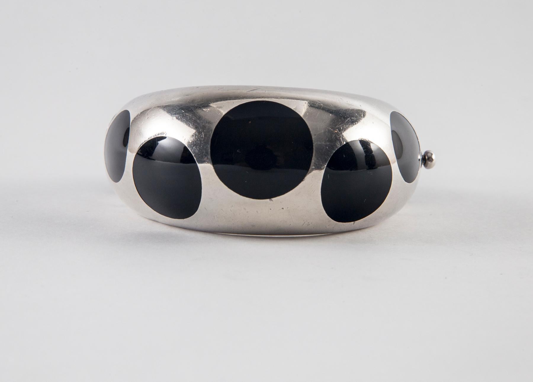 Taxco Sterling Silver and Black Bakelite Polka Dot Bracelet
Interior diameter: 2.25