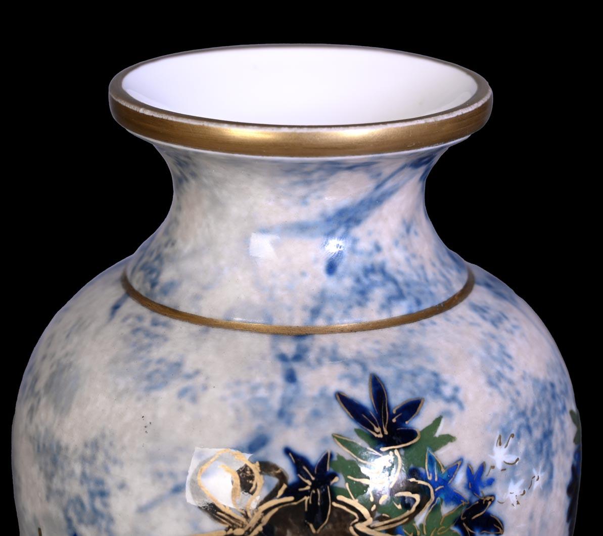 Large glazed porcelain vase from the Sèvres manufactory, decorated in 1880 by Taxile DOAT, one of the most renowned ceramic artists of his time, celebrated for his mastery of pâte-sur-pâte and enamel techniques. The body features a blue and cream