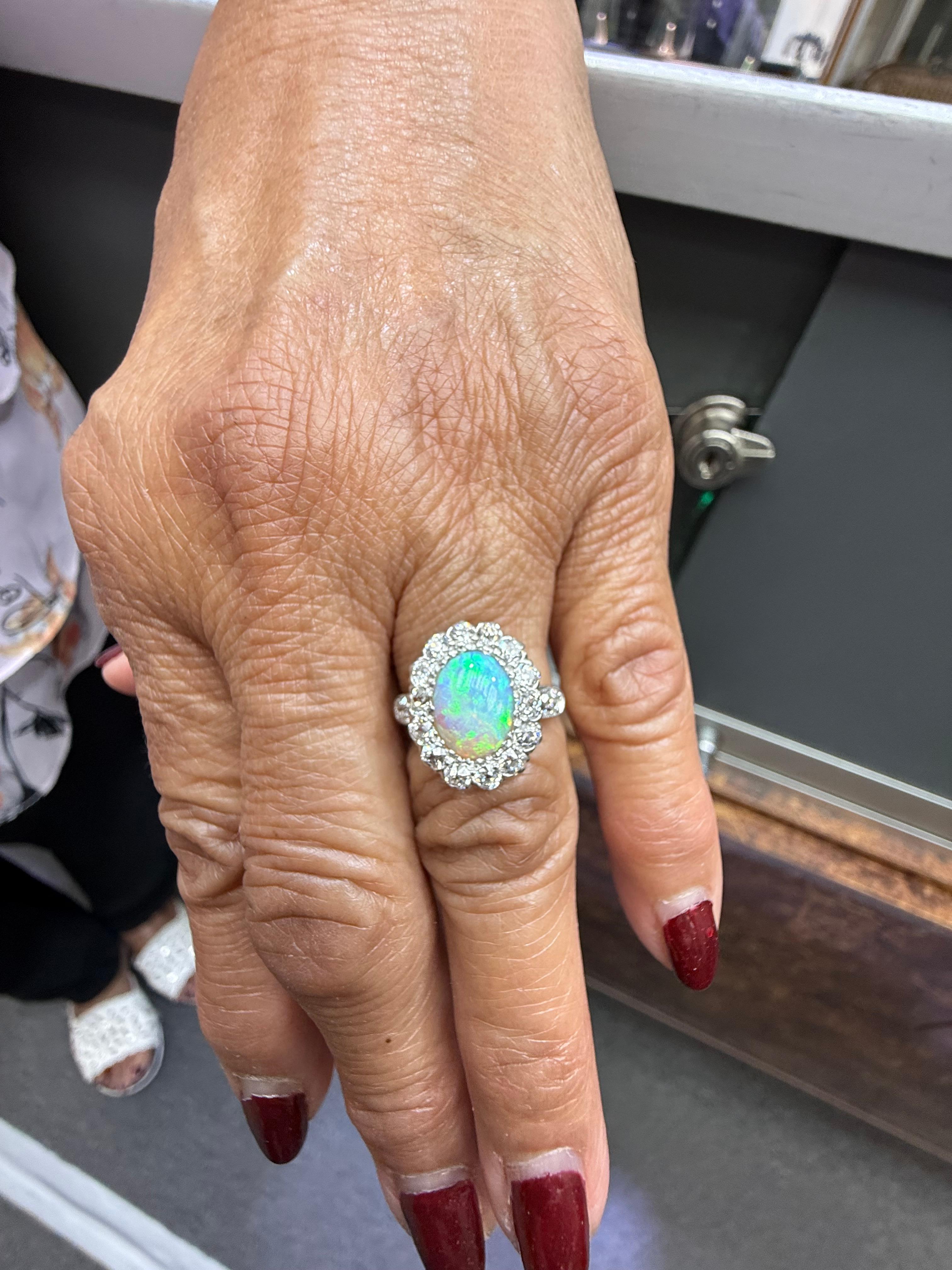 TB Starr Edwardian Opal Diamond Target Ring, circa 1900.

The TB Starr Edwardian Opal Diamond Target Ring was made around 1900.  Theodore B. Starr was a renowned jeweler who started his business back in the early 1860s in New York City.  This ring