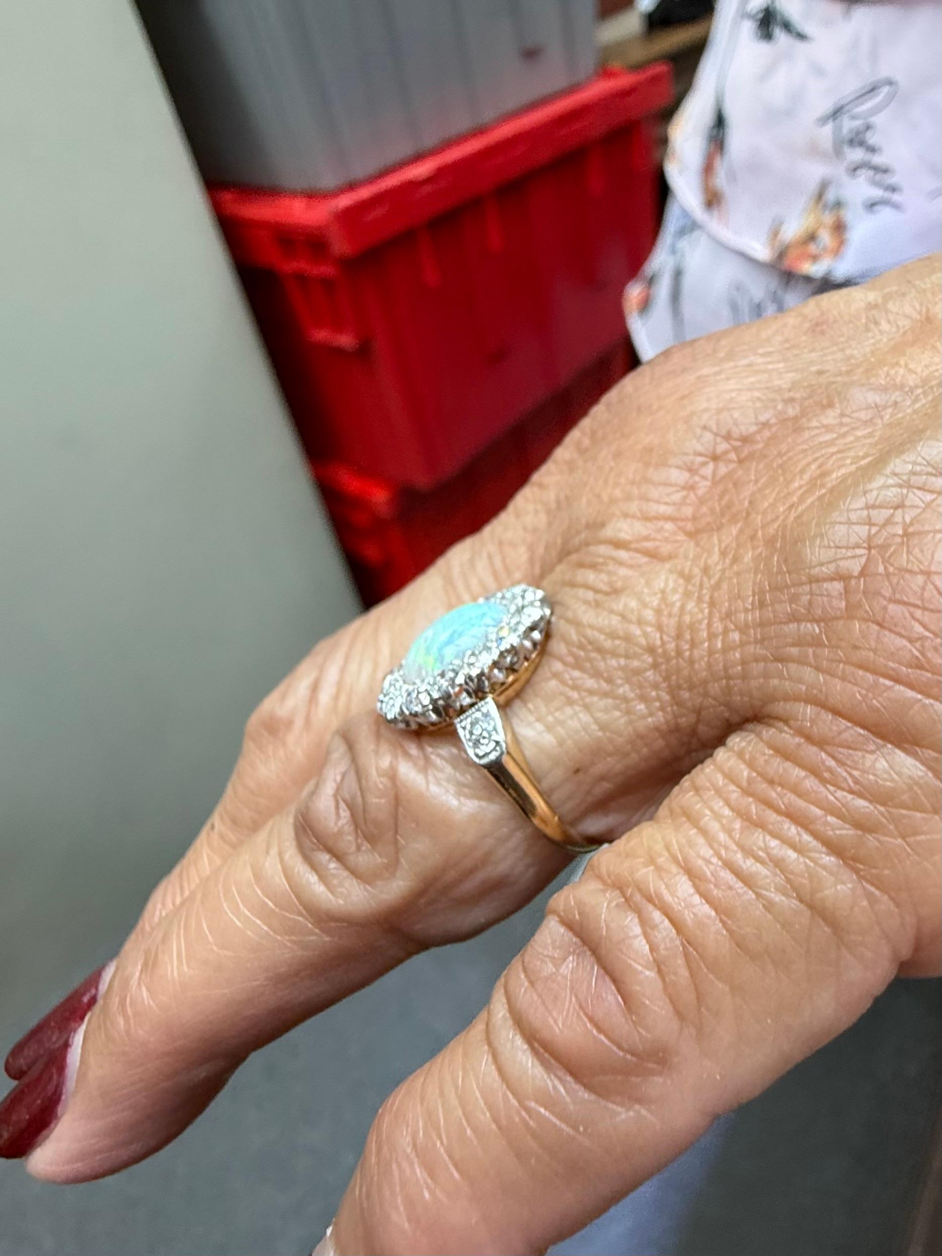 TB Starr Edwardian Opal Diamond Target Ring Circa 1900 In Good Condition For Sale In Los Angeles, CA