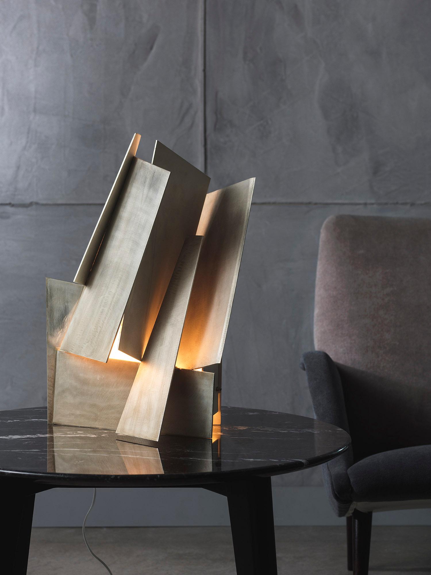 Brushed brass table lamp in brushed silver finish.