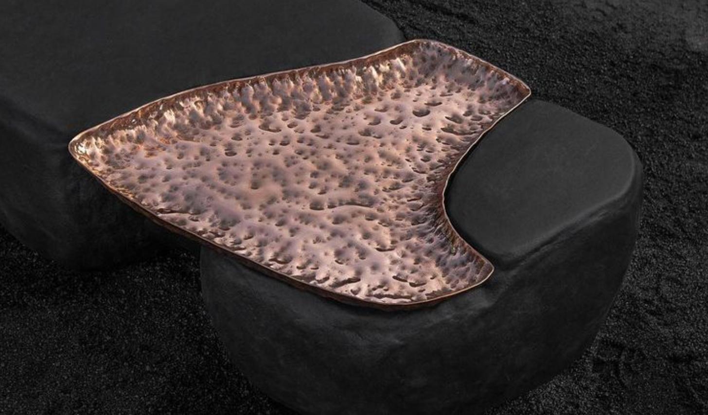 TC coffee table 1 by Studio ThusThat
Unique piece.
Dimensions: 30cm x 105cm x 54cm
Materials: Hand-formed slag geopolymer, hammered copper, brass fitting.

Studio ThusThat is a design practice whose work seeks to unearth the full potential of