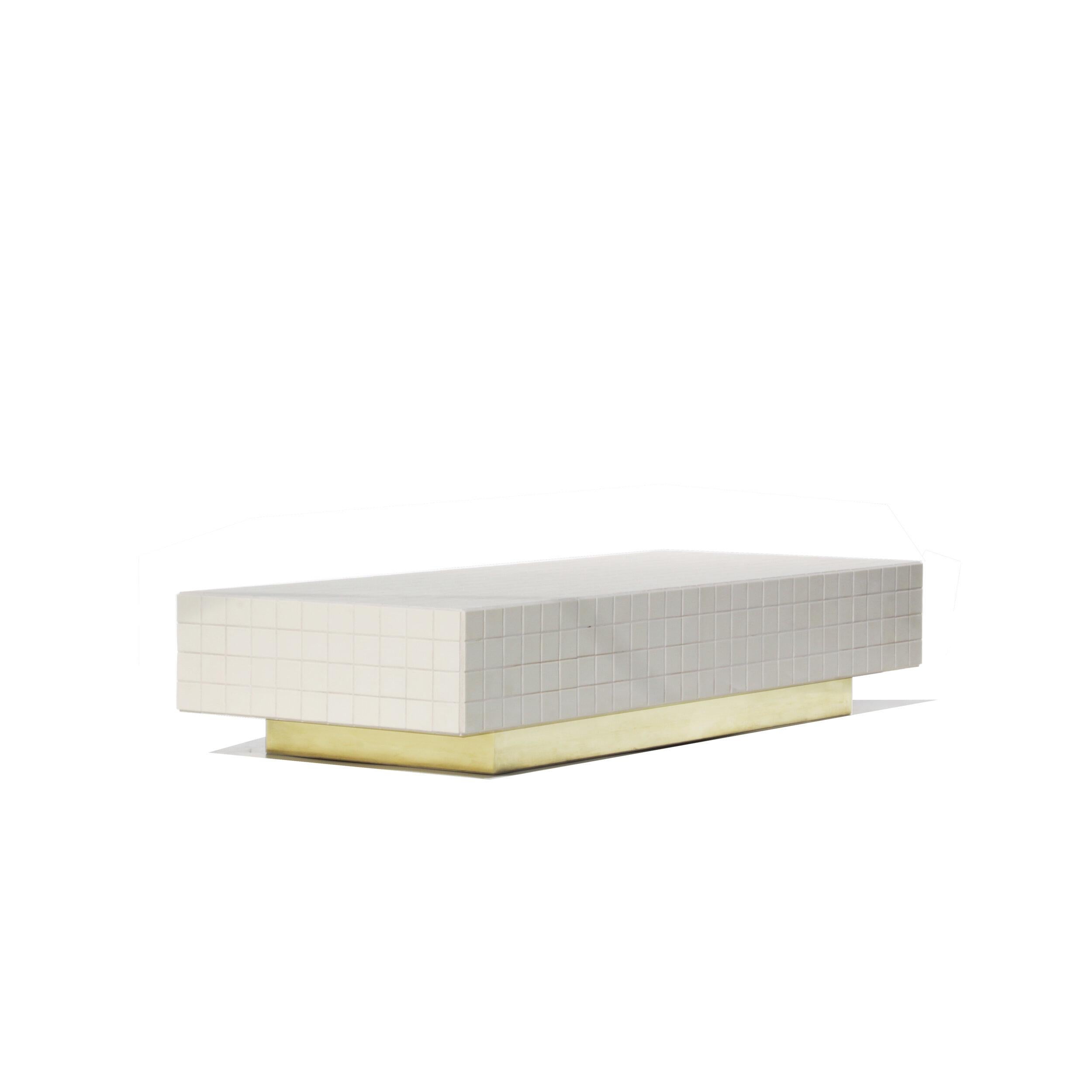Designed and made by Nima Abili in Los Angeles this handcrafted low table is cladded with almond beige matte porcelain tiles and sanded beige grout. Inspired by Brutalist style of architecture this collection offers a variety of pieces designed