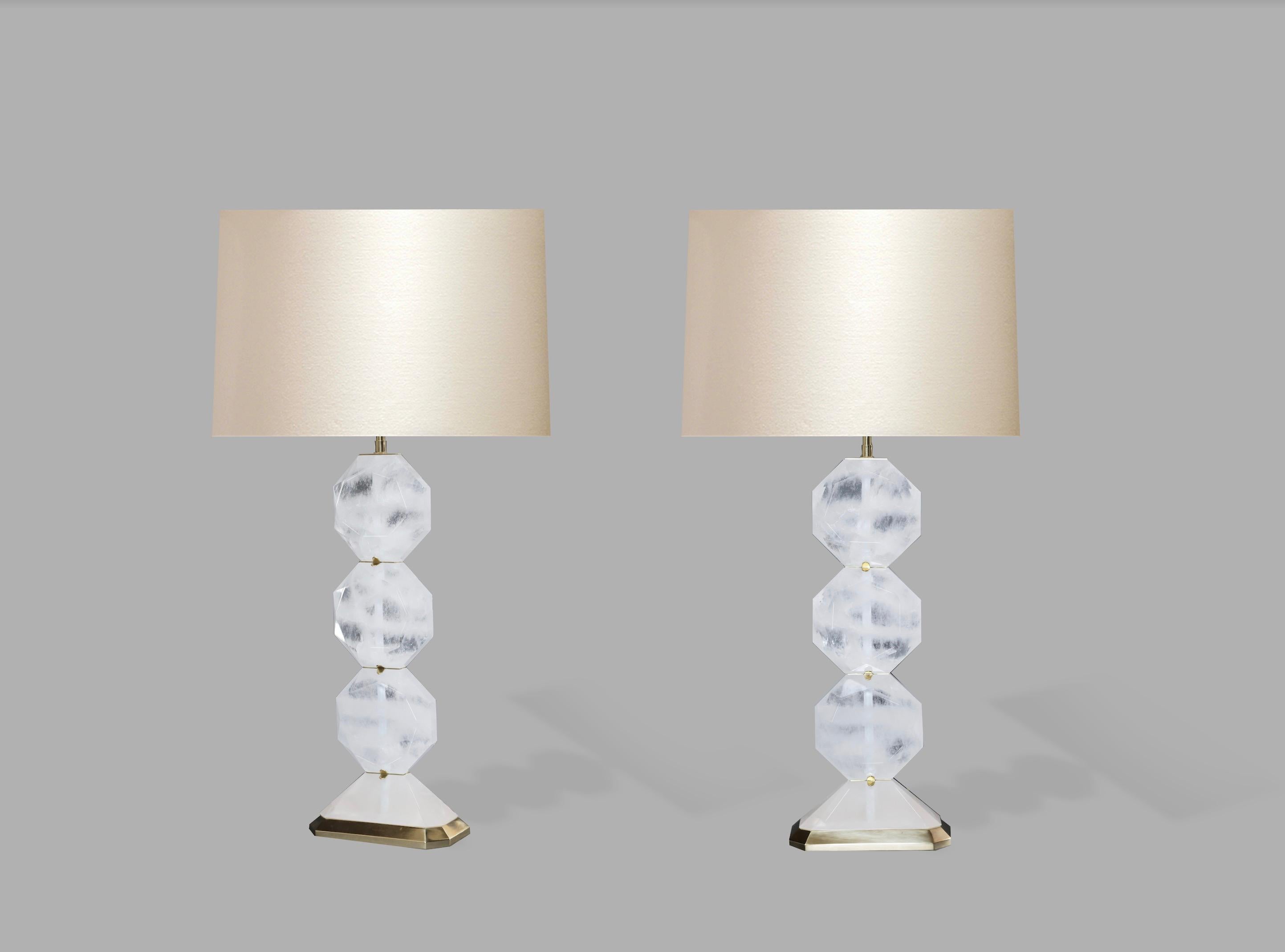 Carved diamond-form triple-stacked rock crystal lamps with polished brass base and inserted decoration.crated by Phoenix gallery 
Measure: 21.5
