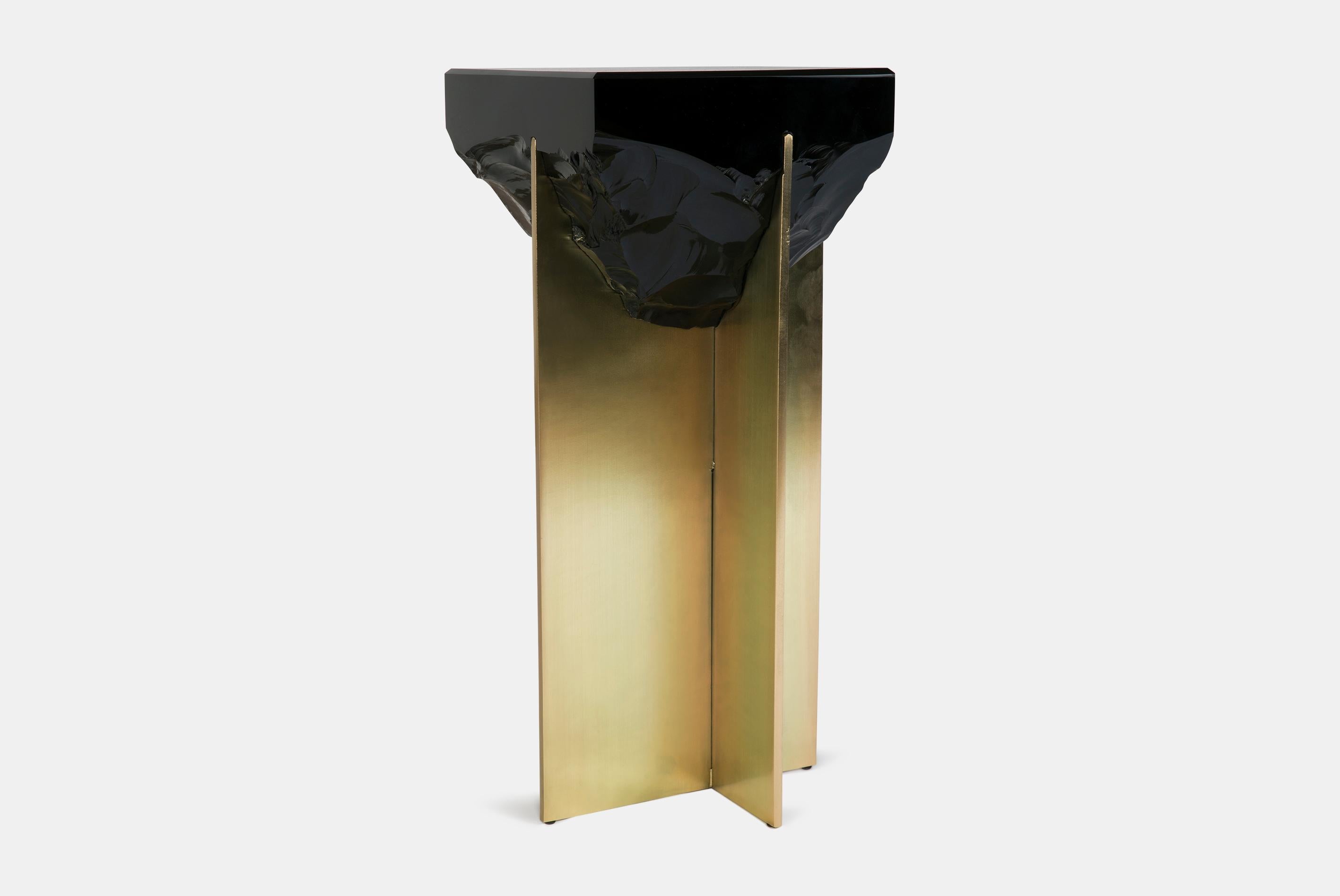 An Obsidian stone side table created and designed by 