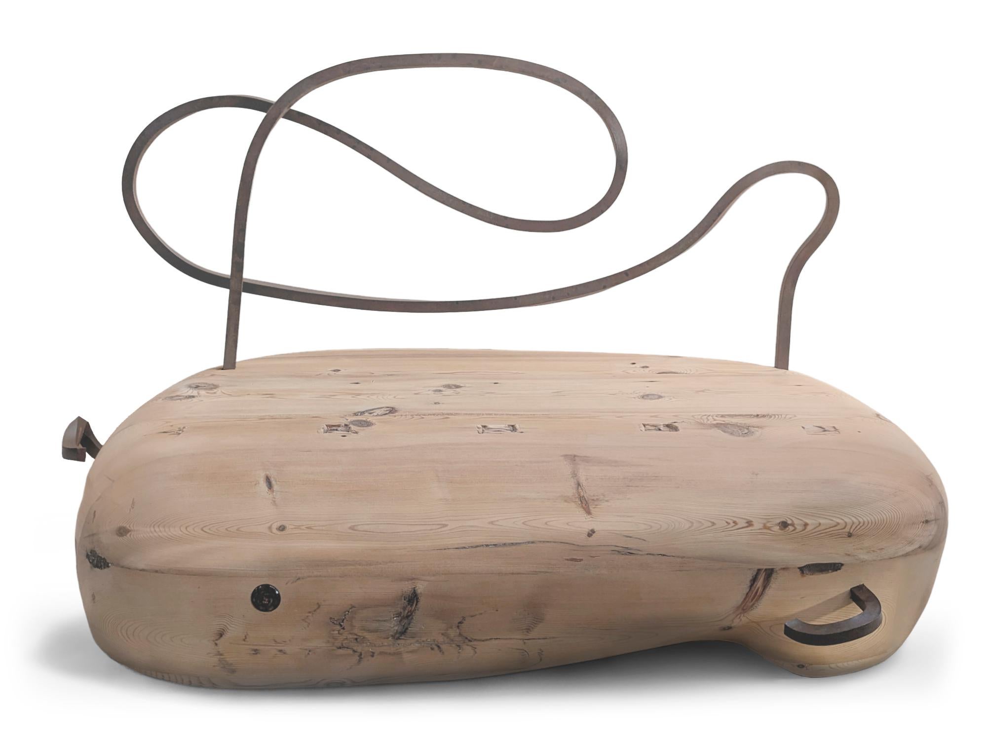 Tea 1750 Collection Sculptural Divan by AMBER x IÑIGO CALLEJA
Dimensions: W 180 x D 100 x H 100 cm. 
Materials: Old Tea Beams, Steel. 

Iñigo Calleja is an engineer, designer and soulful maker born in Spain. He landed his first graduate job at