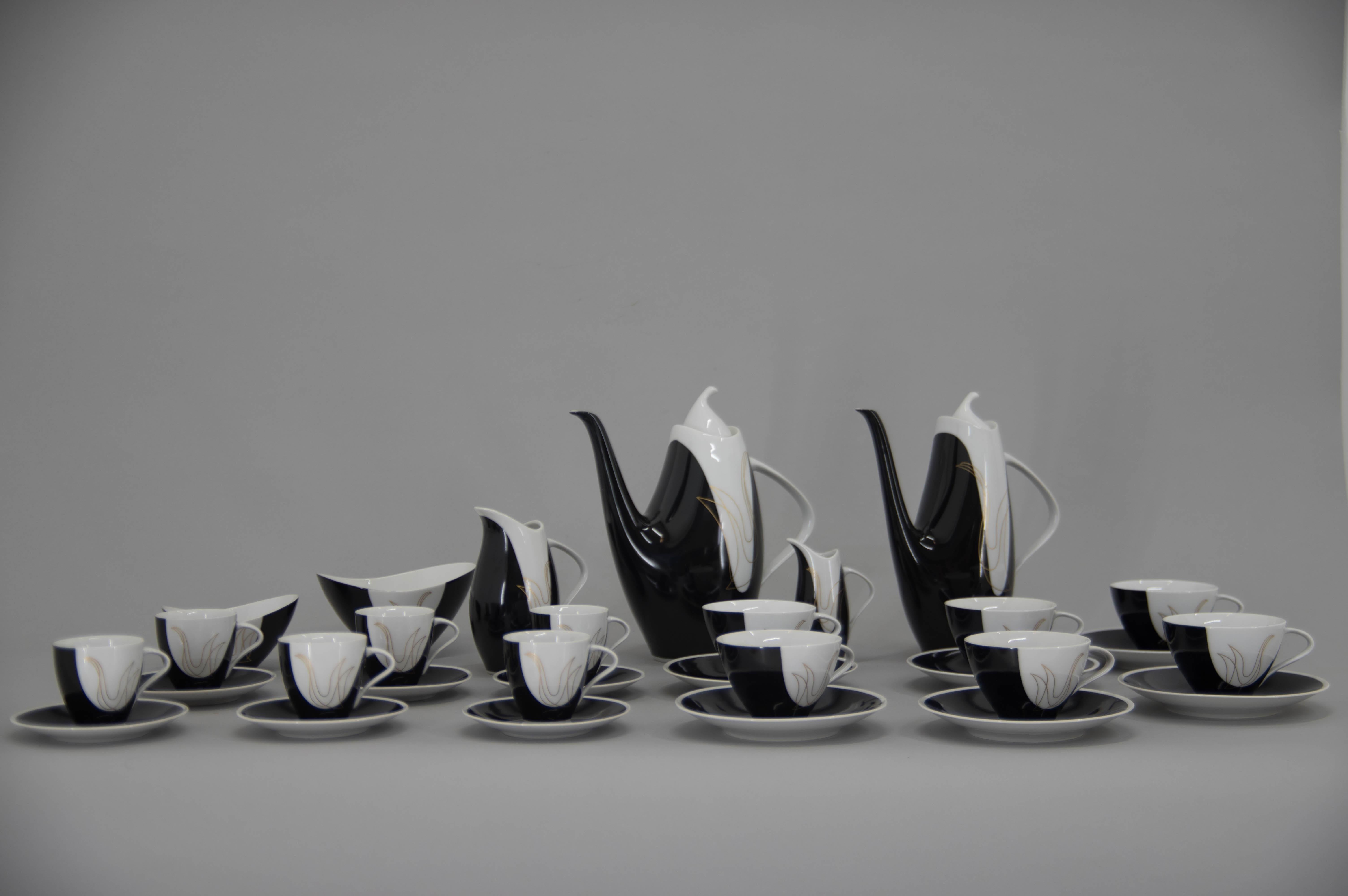 Elka coffee and tea set designed by Jaroslav Jezek in 1957
Awarded by Grand Prix at the Expo 1958
Manufactured and marked by Brezova - Pirkenhammer
6 tea cups with plates
6 coffee cups with plates
1 tea pot
1 coffee pot
1 cream pot
2 sugar bowls
1