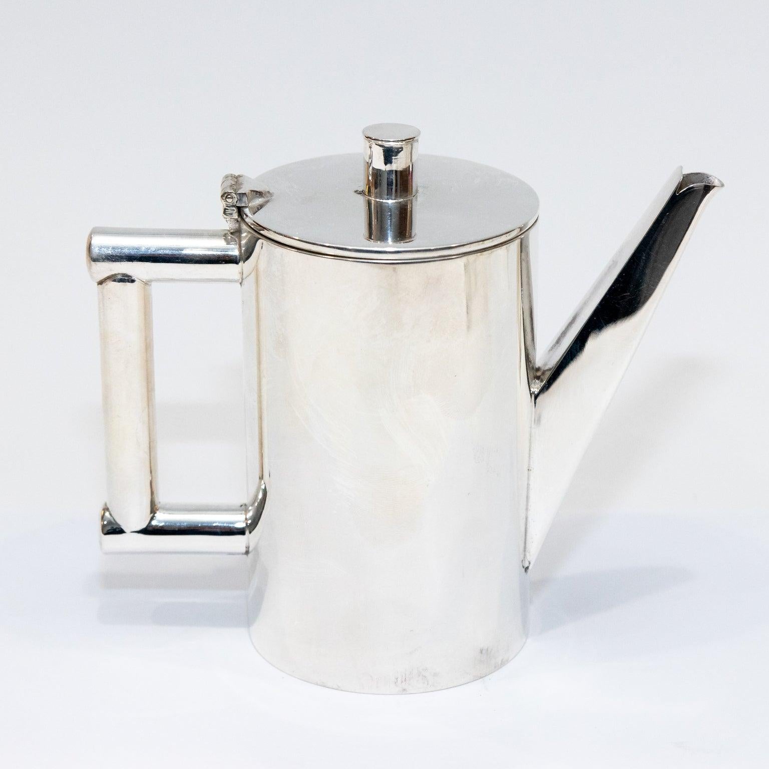 Mid-20th Century, hotel silver 5-piece tea and coffee set. Please note of wear consistent with age.