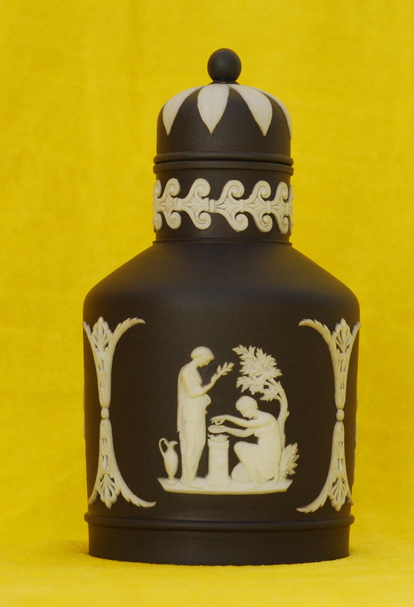 Tea canister in black jasper dip, decorated with psyche bound to a tree, sacrifice, and Nike & a warrior.