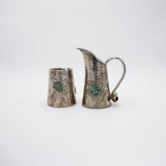 Théière et sucrier en métal argenté.