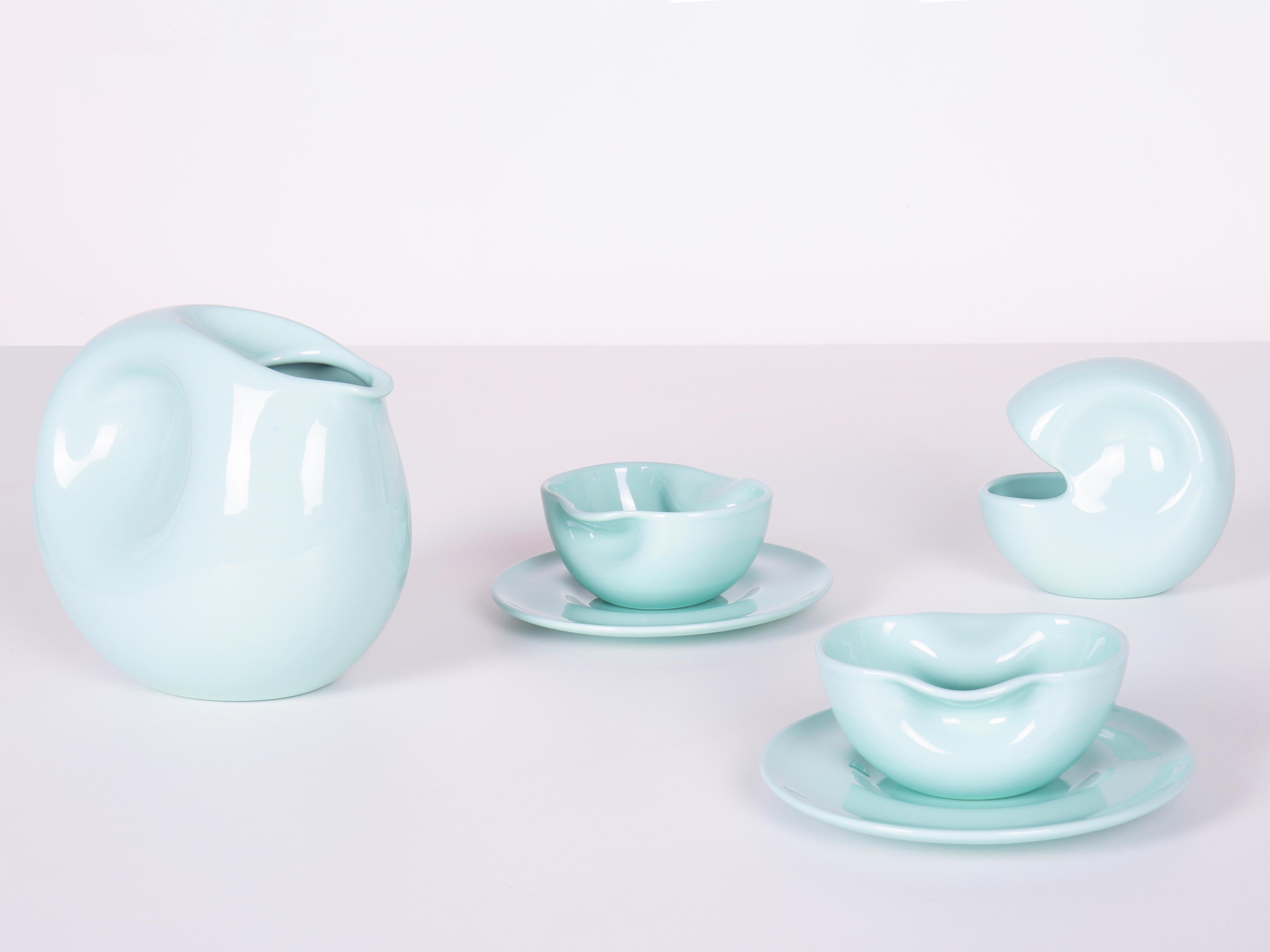 Designed in 1975 - Paradisoterrestre Edition 2023

Material: enameled pottery

Colours: mint green; also available in white or pink.

The tea set designed by Italian artist Augusto Betti in 1975 consists of 1 teapot, 1 sugar bowl, 2 cups and 2