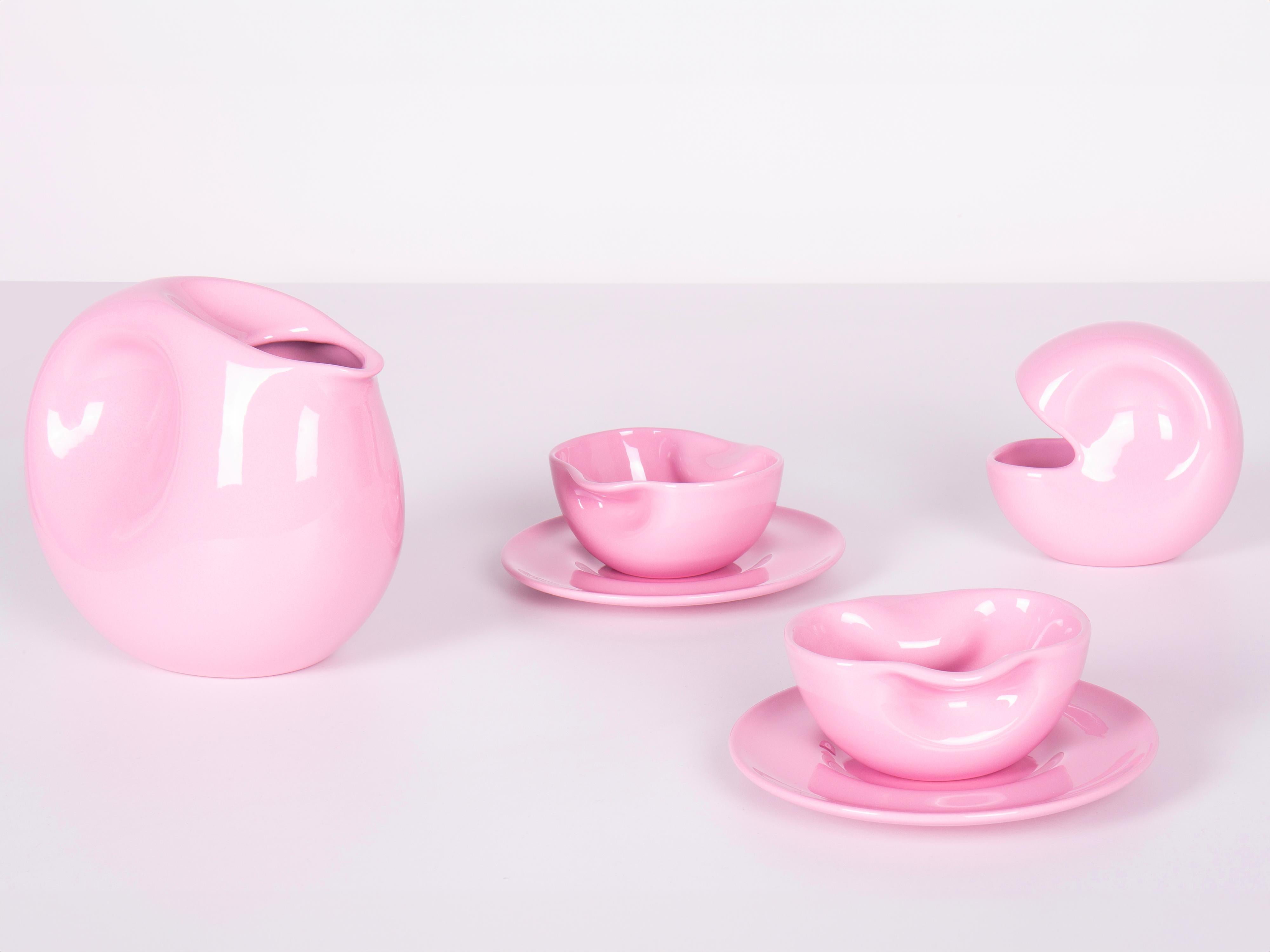 Designed in 1975 - Paradisoterrestre Edition 2023

Material: enameled pottery

Colours: pink; also available in mint green or white.

The tea set designed by Italian artist Augusto Betti in 1975 consists of 1 teapot, 1 sugar bowl, 2 cups and 2