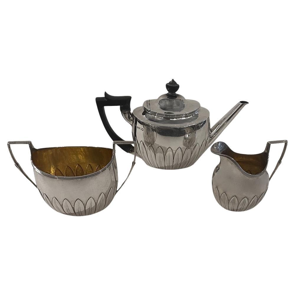 Sterling Tea set, with stylized relief silver leaf , George Fox, London 1881. For Sale