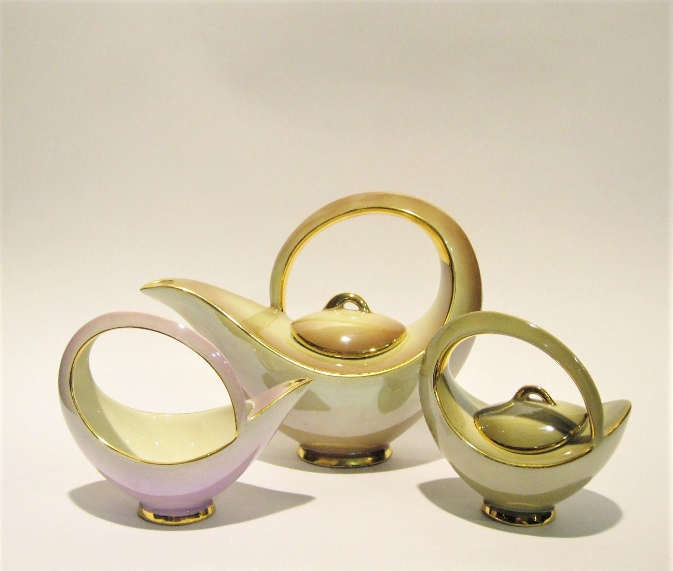 Tea Set by Italo Casini, Sesto Fiorentino, Italy, circa 1950s

Offered for sale is a Mid-Century Modern tea set by Italo Casini, Sesto Fiorentino, Italy. Comprised of 6 cups and saucers, 1 teapot with cover, 1 sugar bowl with lid, 1 milk jug, for a