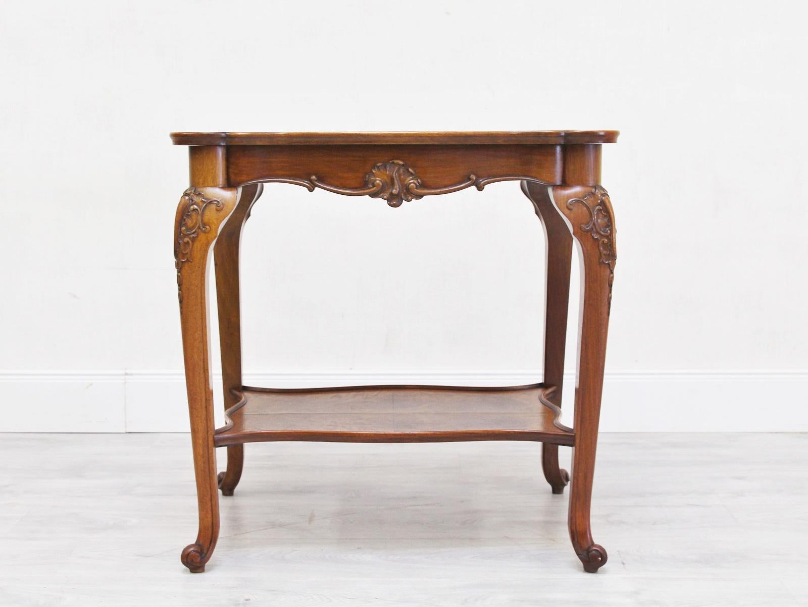 Tea table or minibar
Tea table made of walnut wood

This is an exclusive tea table made of solid walnut wood
The product is kept in a natural color and fits perfectly with the colonial style.
The lovingly embellished ornaments and the elegantly