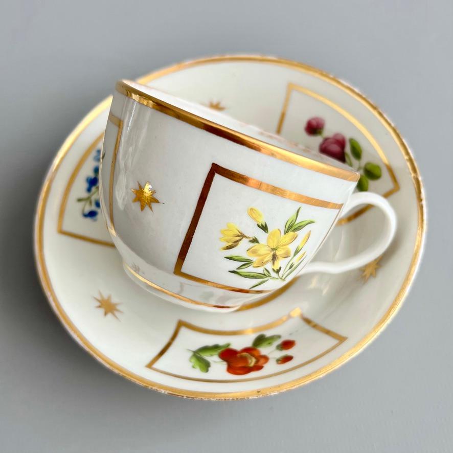 Hand-Painted Teacup Trio Coalport John Rose, Flowers in Gilt Squares and Stars, ca 1800 For Sale