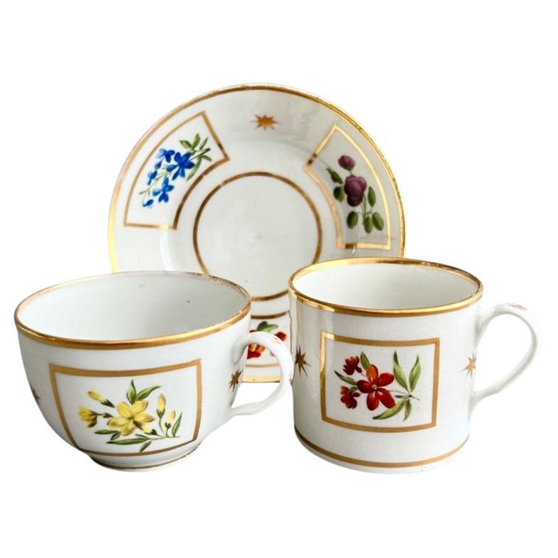Teacup Trio Coalport John Rose, Flowers in Gilt Squares and Stars, ca 1800 For Sale