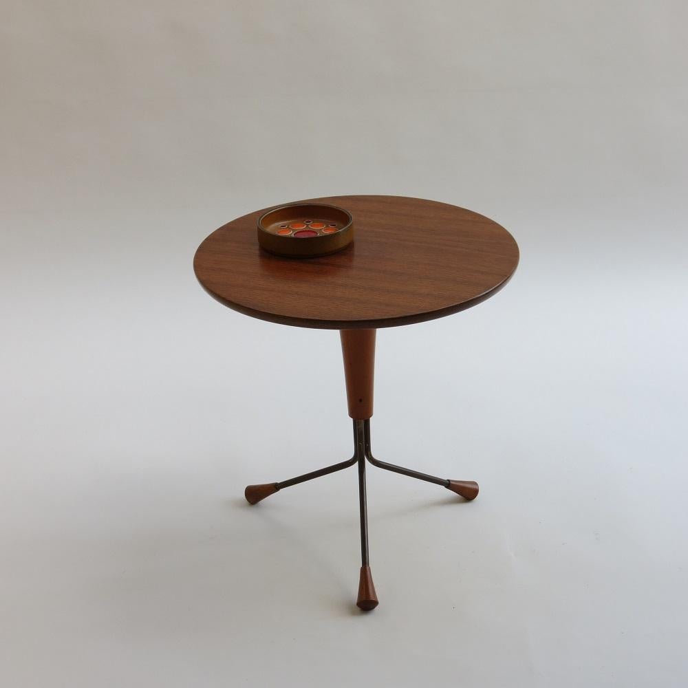 Wonderful 3 legged teak side table designed by Albert Larsson for Alberts Tribro, Sweden. Teak top and brass legs with very nice teak detail to the foot. Originally designed in 1959, this is a 1960s edition.  In good vintage