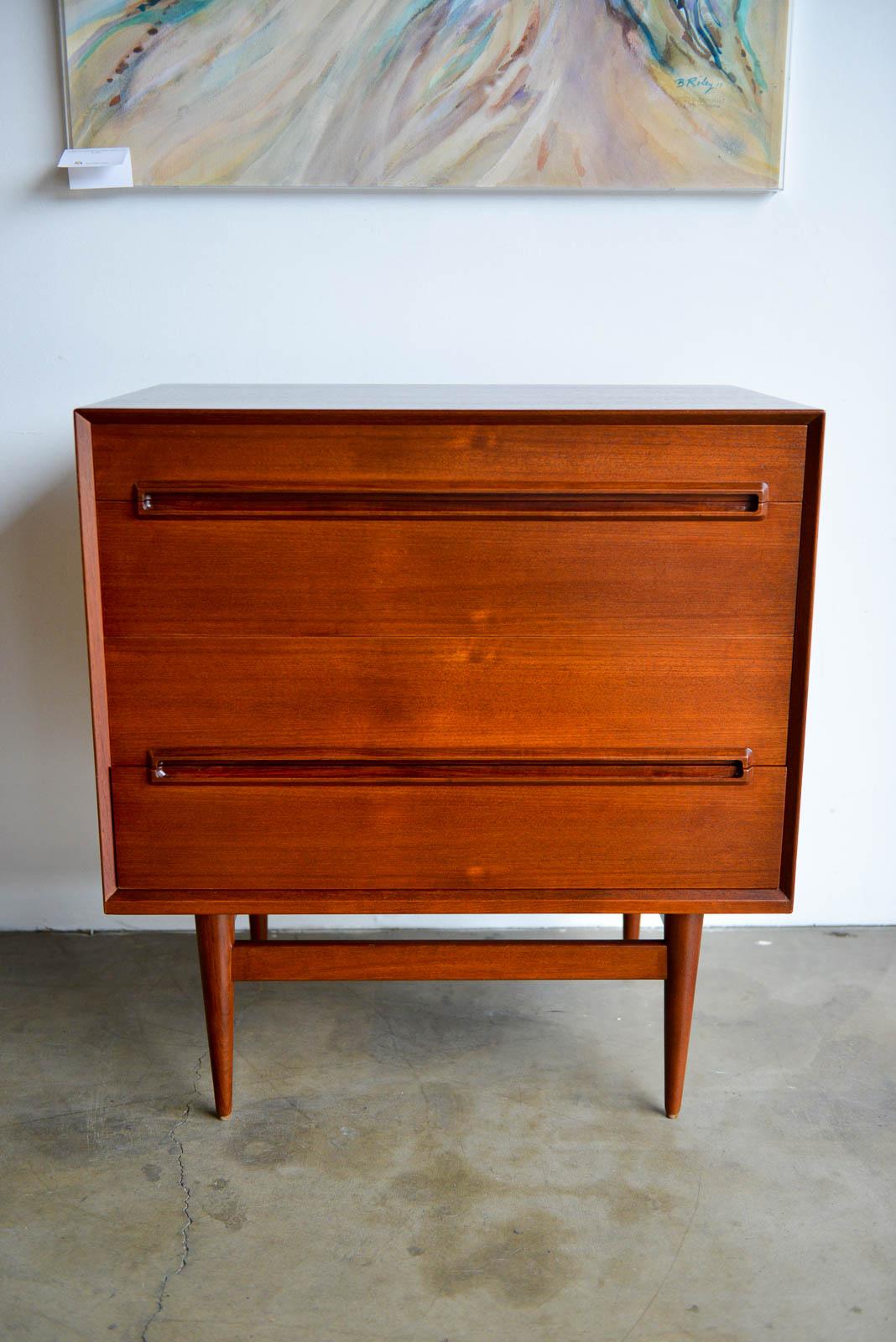 Teak 4-drawer cabinet by Erik Worts, Denmark 1959. Purchased by original owner from Den Permanente, Copenhagen in 1959. Provenance available. Professionally restored in showroom condition this rare piece shows off the delicate base and legs that