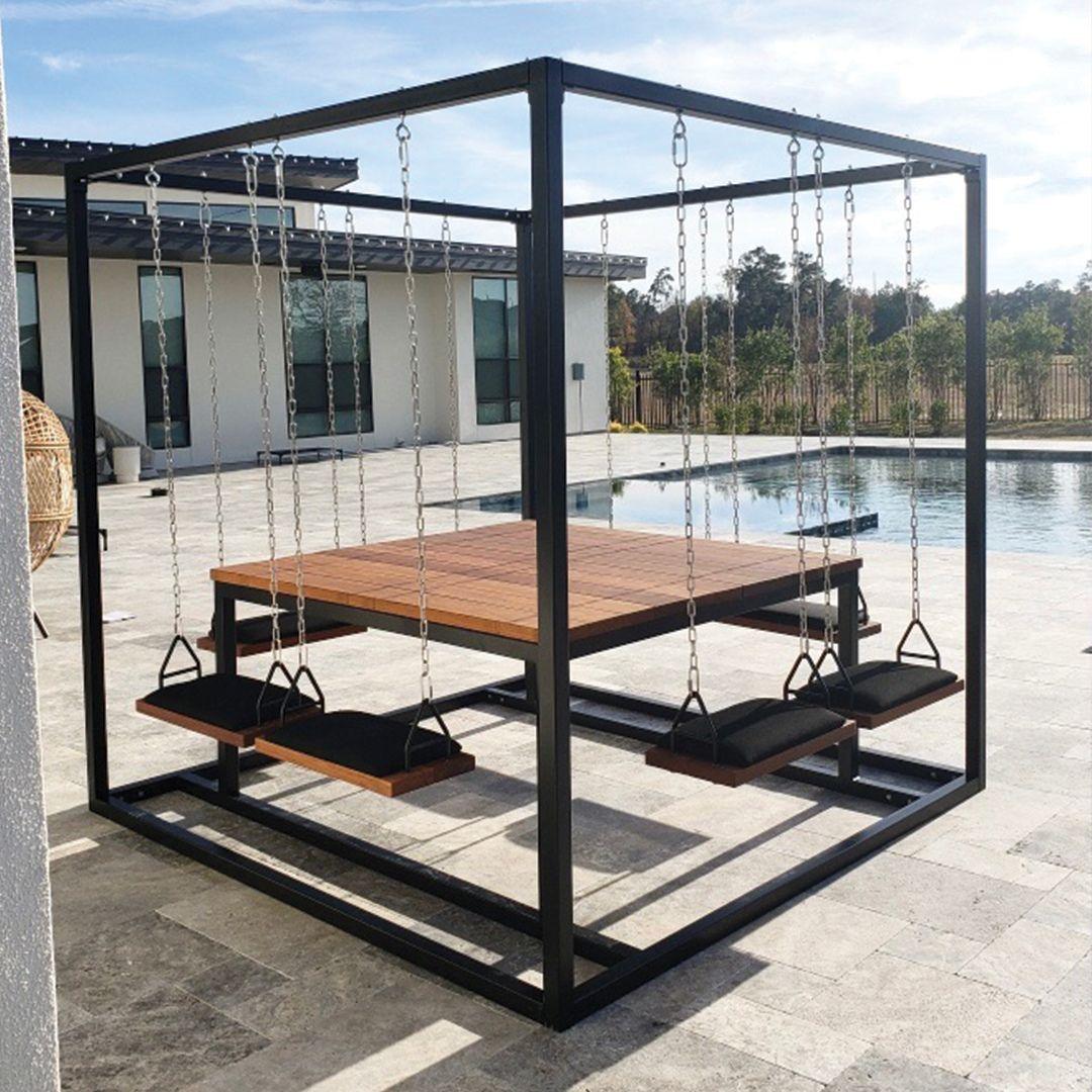 Introducing our 8-Seater SwingTable, a harmonious blend of design, comfort, and playful innovation. Showcasing a sleek black frame that effortlessly complements any decor, this SwingTable features soft and durable black Sunbrella seat cushions,