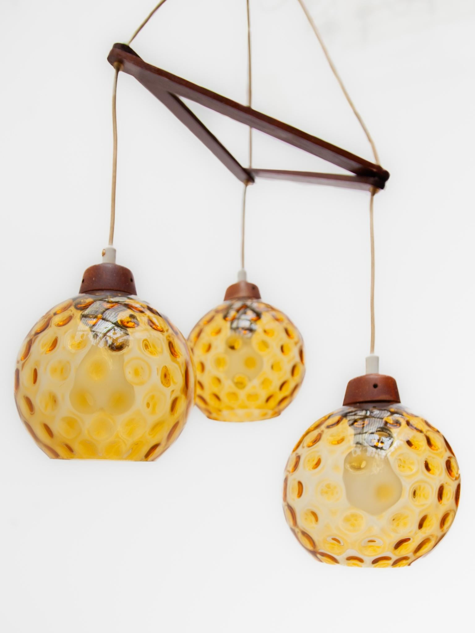 Mid-20th Century  Teak and Amber Glass Bowls Cascade Chandelier made in Denmark 1950s For Sale