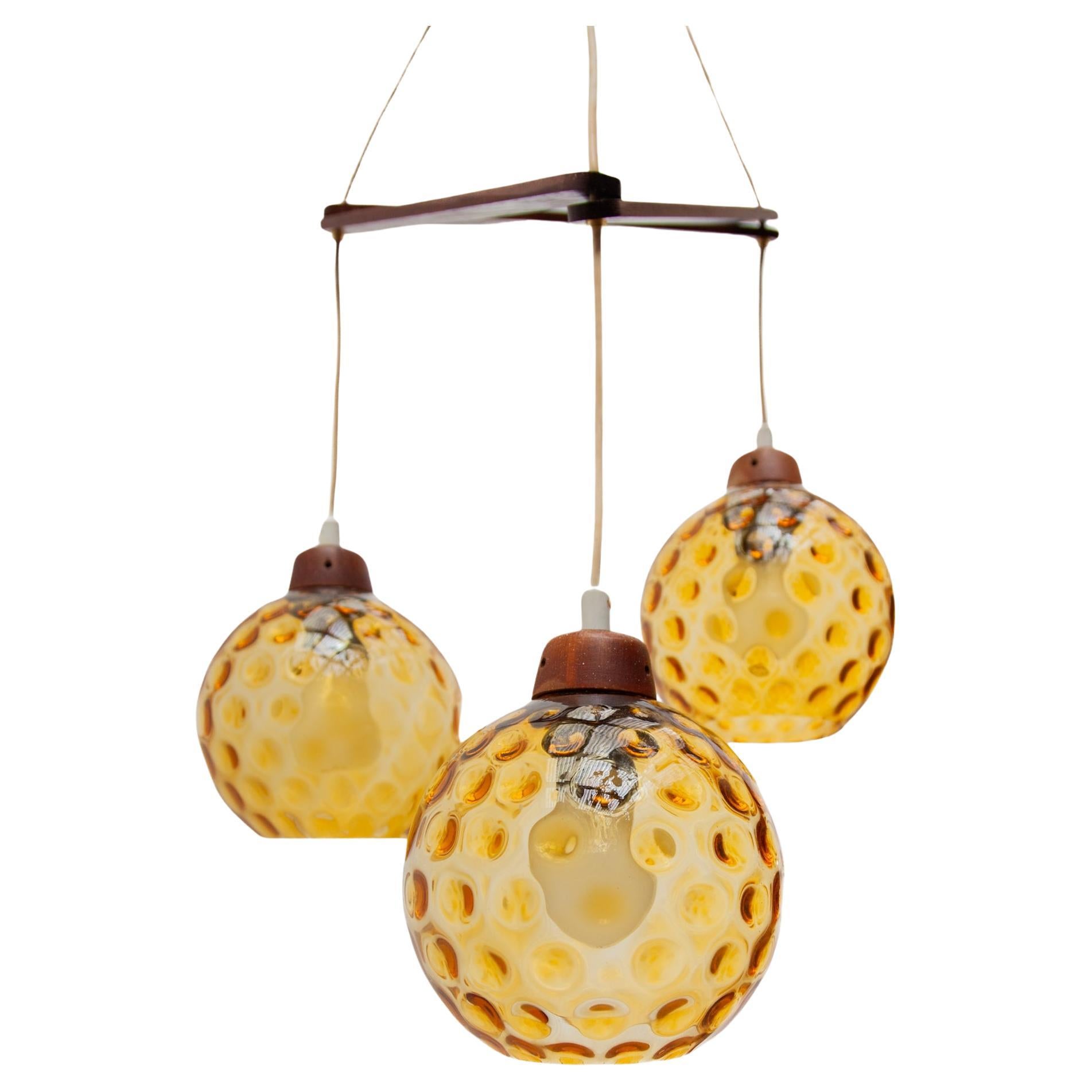  Teak and Amber Glass Bowls Cascade Chandelier made in Denmark 1950s For Sale