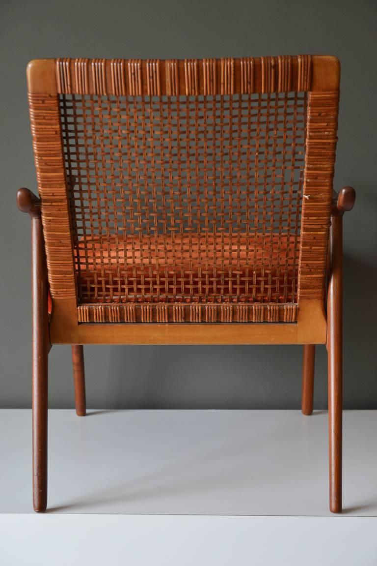Scandinavian Modern Teak and Cane Lounge Chair Model 571 by Fredrik Kayser, Norway, circa 1960