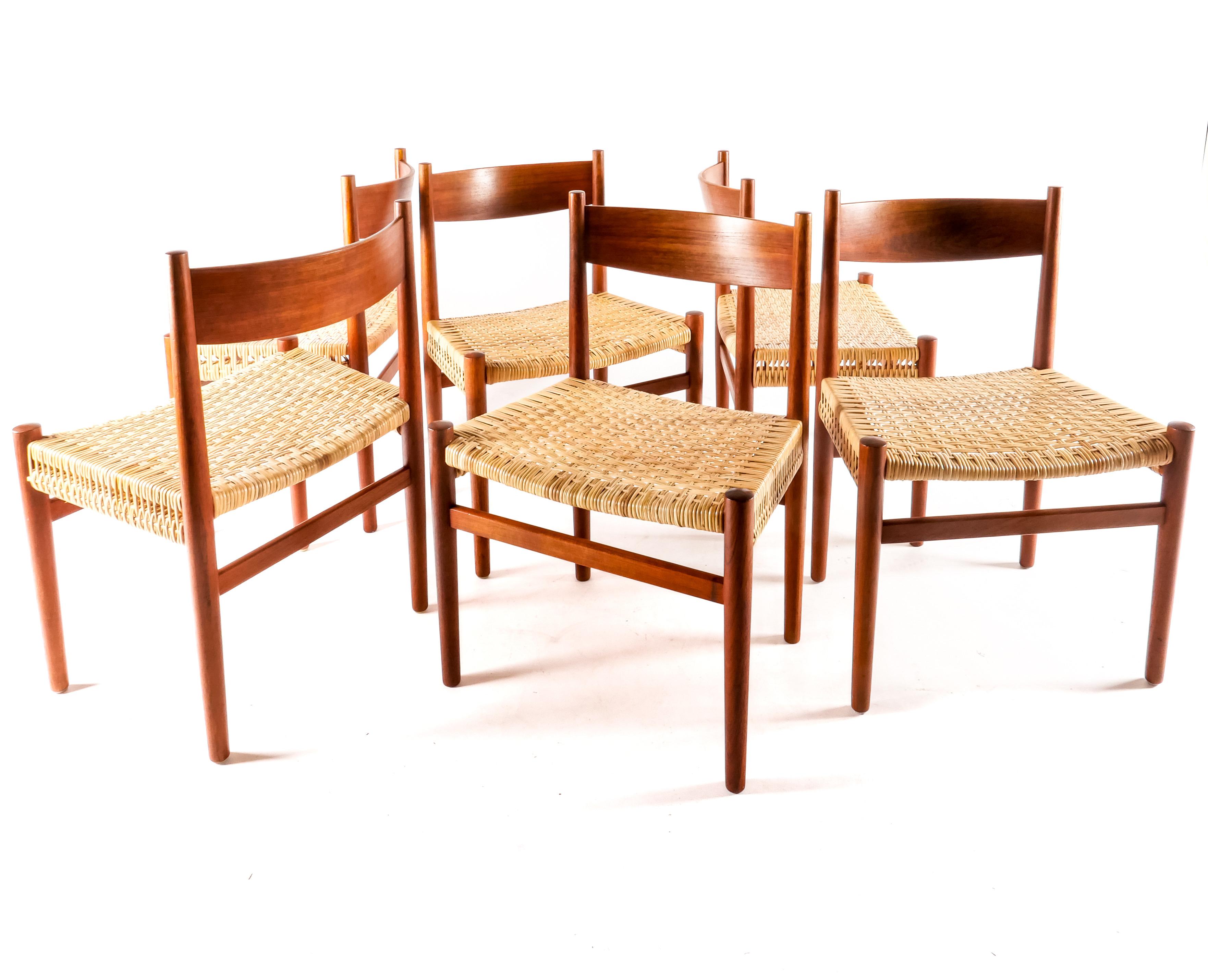 Rare model. CH40 in Teak with hand-caned rattan seats. Set of six side chairs recently imported from Europe. Classic and minimalist design by Hans J. Wegner produced by Carl Hansen Denmark circa 1960s. Seats have all just been professionally rewoven