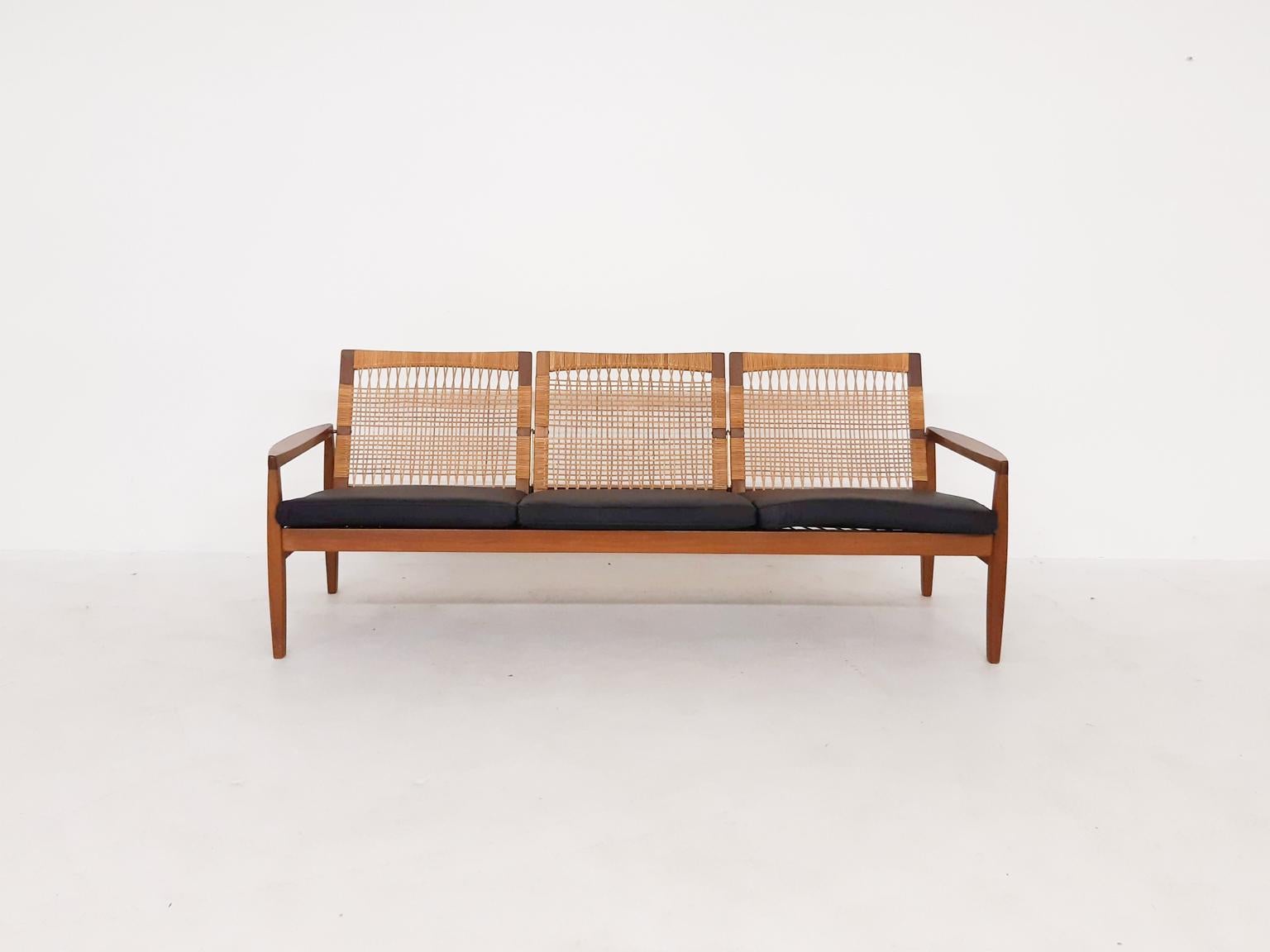 Very elegant and high end Danish Mid-century three-seat sofa by Hans Olsen for Juul Kristensen from the 1950s.

This eyecatcher is from the same period and series as the modular TV Bench Model 161, also by Olsen. Instead of being modular, this model