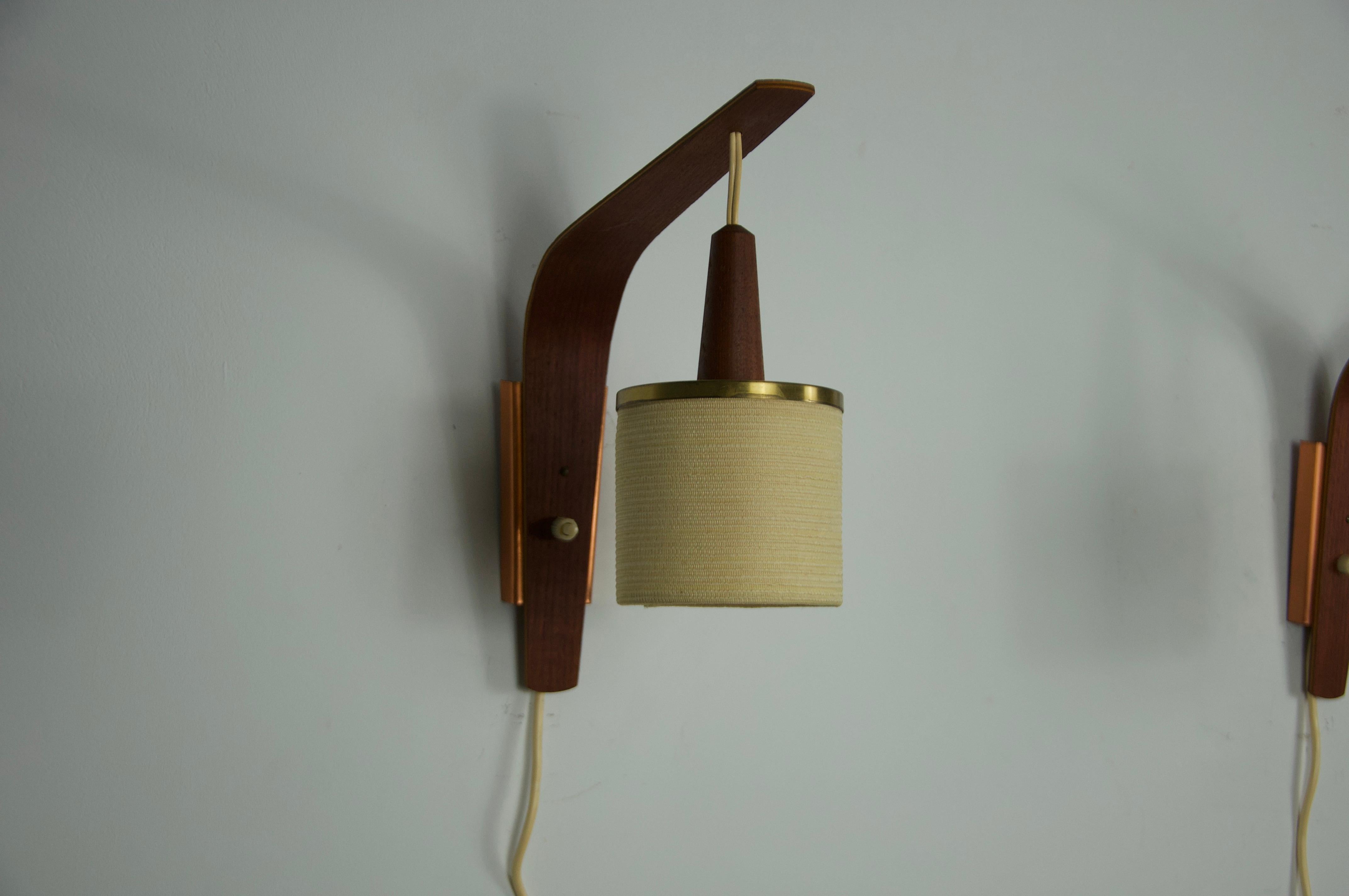 Teak Lampade da parete in teak e con paralume in tessuto, anni '60, Germania in vendita