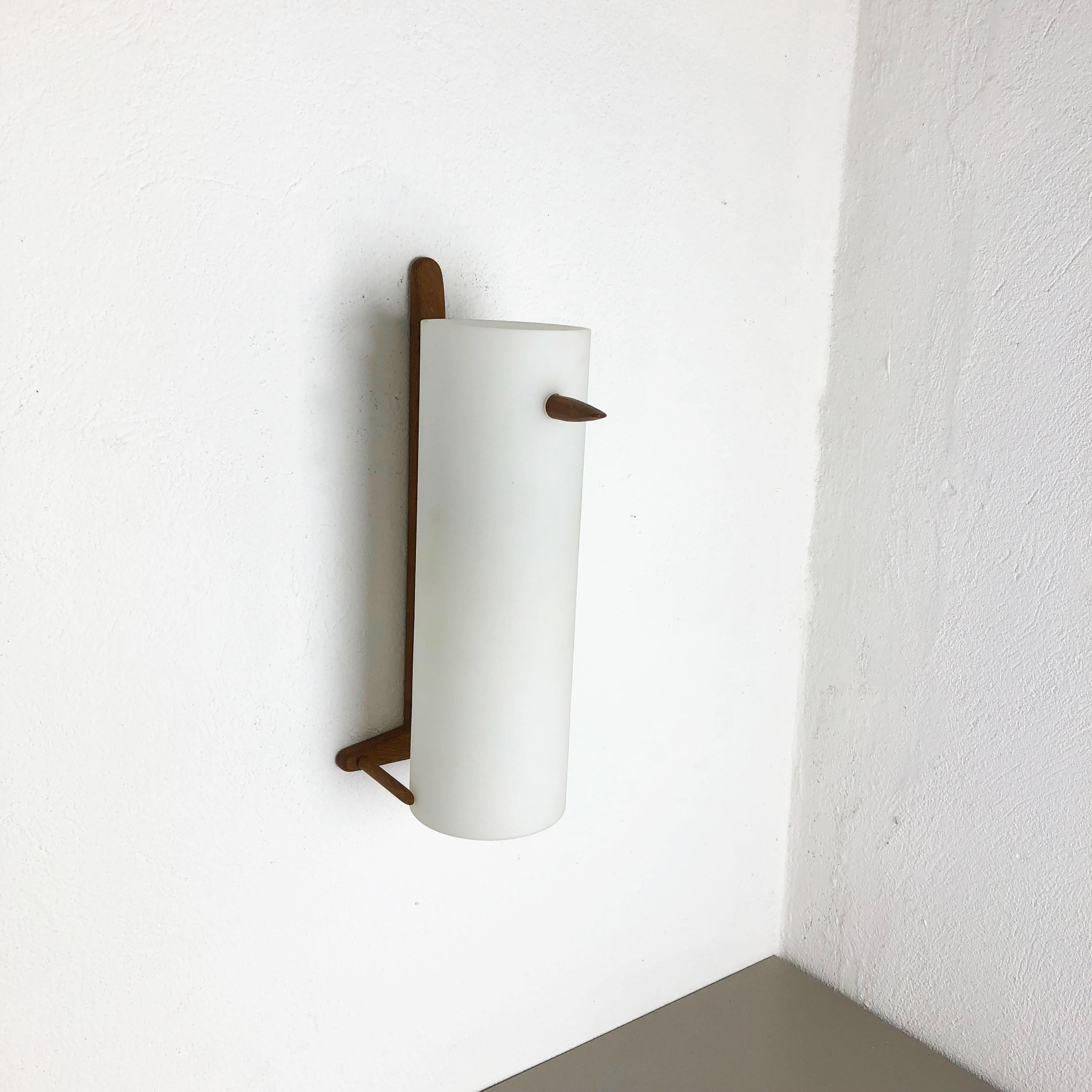 Swedish Teak and Glass Wall Sconces Light by Uno & Östen Kristiansson for Luxus, Sweden For Sale