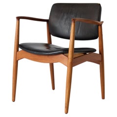 Teak and Leather Armchair by Erik Buch