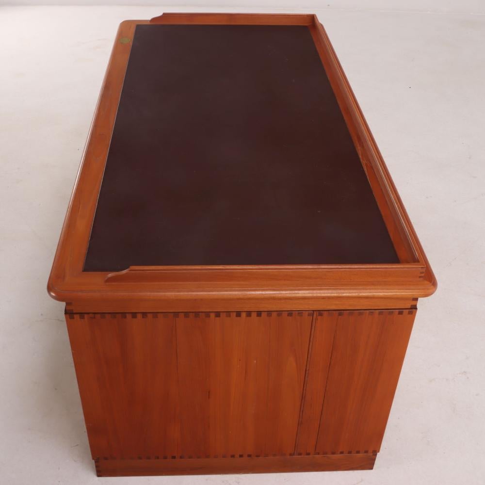 Danish Teak and Leather Desk by Finn Hansen, c. 1980 For Sale