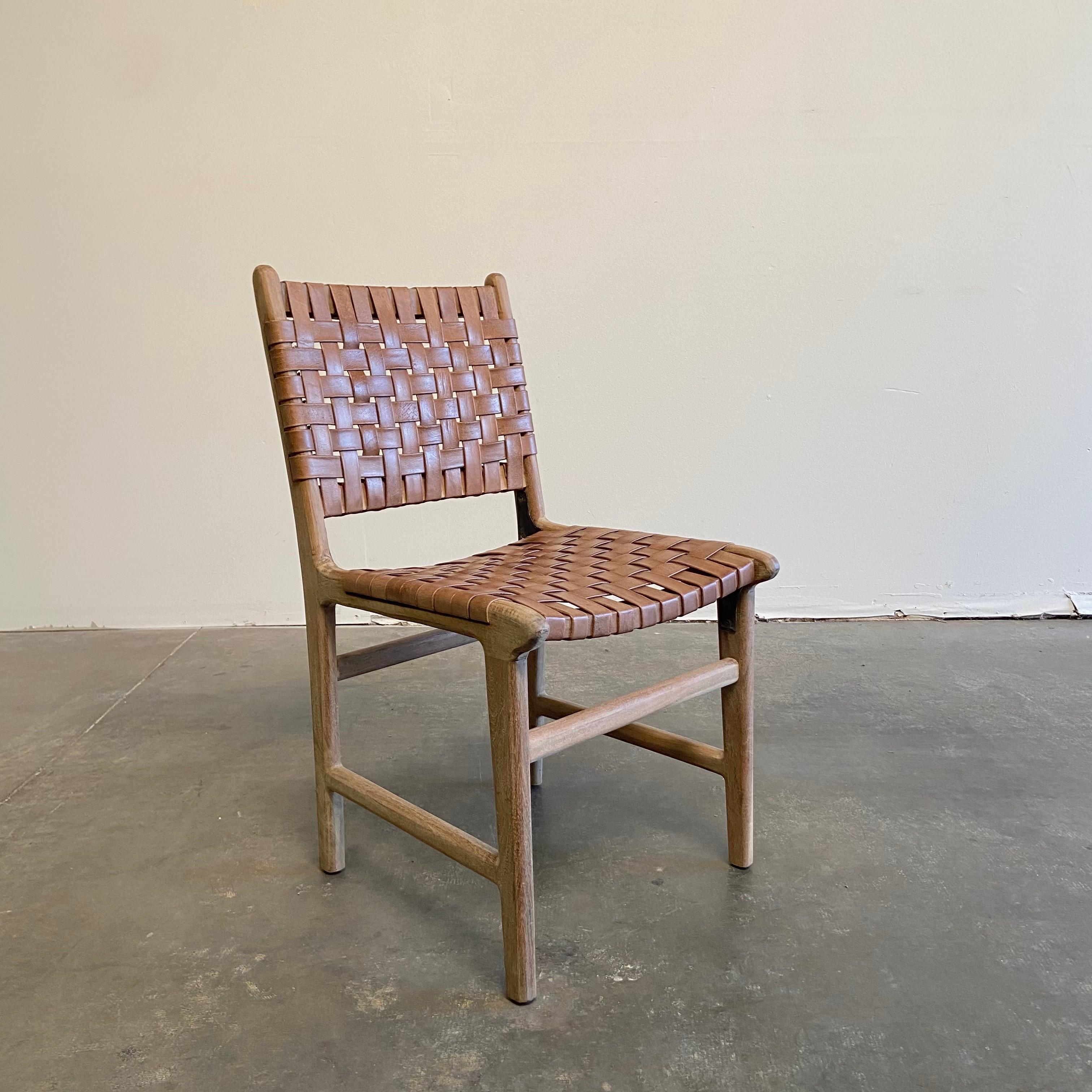 Brown leather strap diningchair 
Size: 18” W x 23” D x 33-1/2” H
SH: 18”
Beautiful vintage style leather in a chestnut brown, with natural teak frames.
Very solid and sturdy, very comfortable.
Part of our current production. Whatever we have in