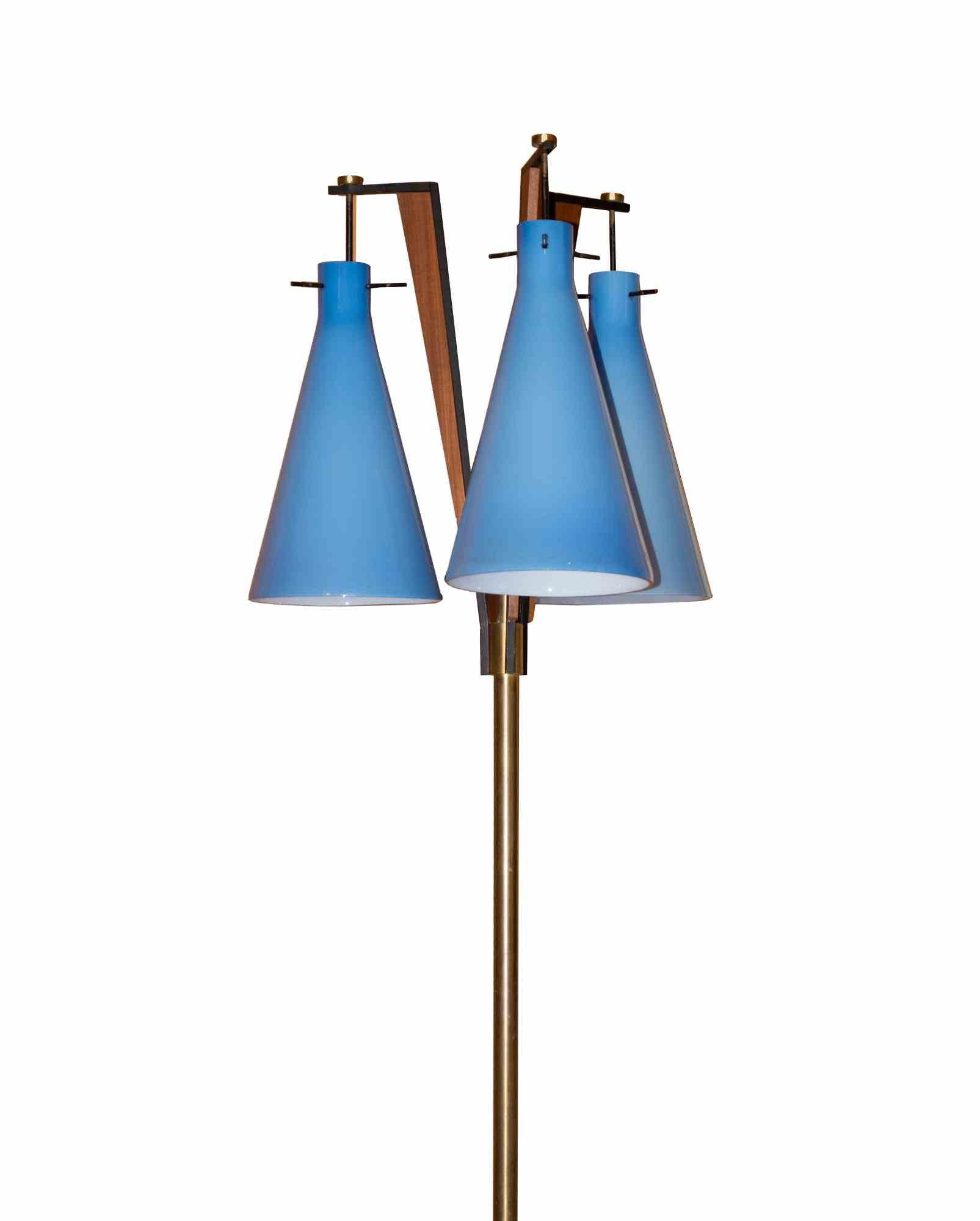 Teak and murano floor glass lamp is an original design lamp realized in 1955 and attributed to Stilnovo.

Very rare specimen realized in murano glass and teak.

Made in Italy. 

The dimensions and the weight are indicative.

Excellent