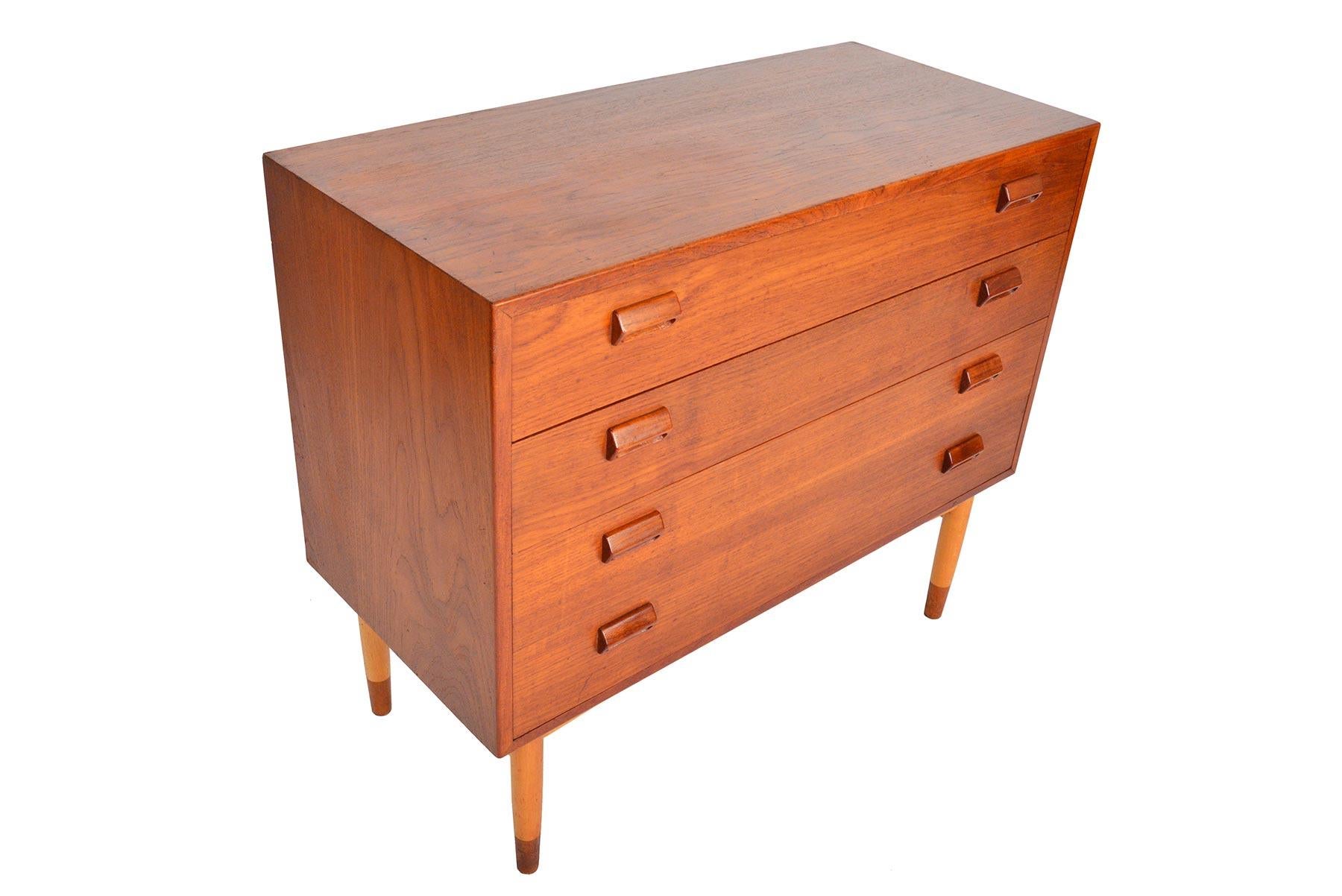 This beautiful gentleman’s chest was designed by Børge Mogensen for Søborg Møbelfabrik in 1951. The case is expertly crafted in teak and stands on a solid oak base with teak end caps. Each drawer front is adorned with the designer’s signature