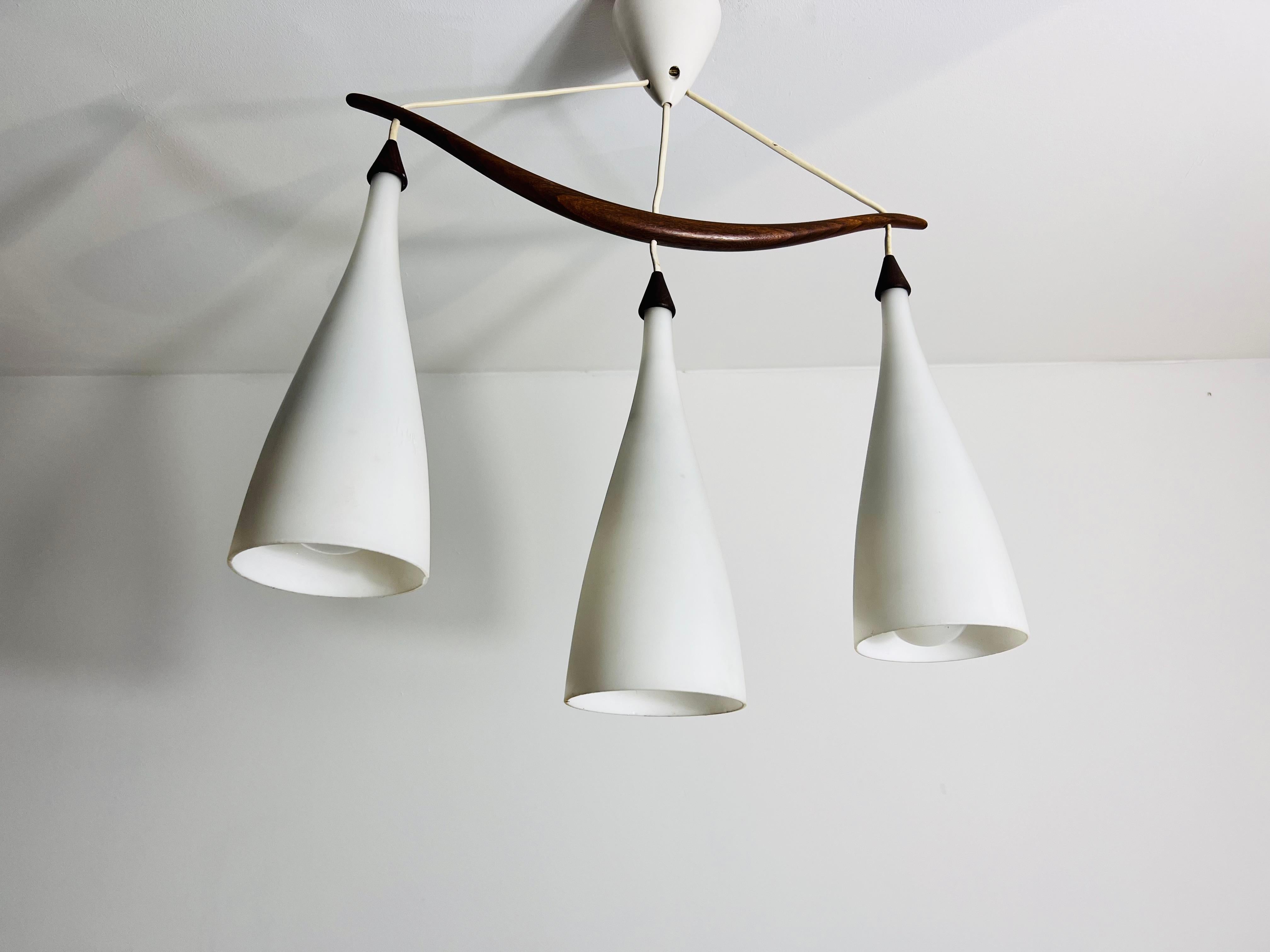 Swedish Teak and Opal Glass Pendant Lamp by Uno & Östen Kristiansson for Luxus Sweden For Sale