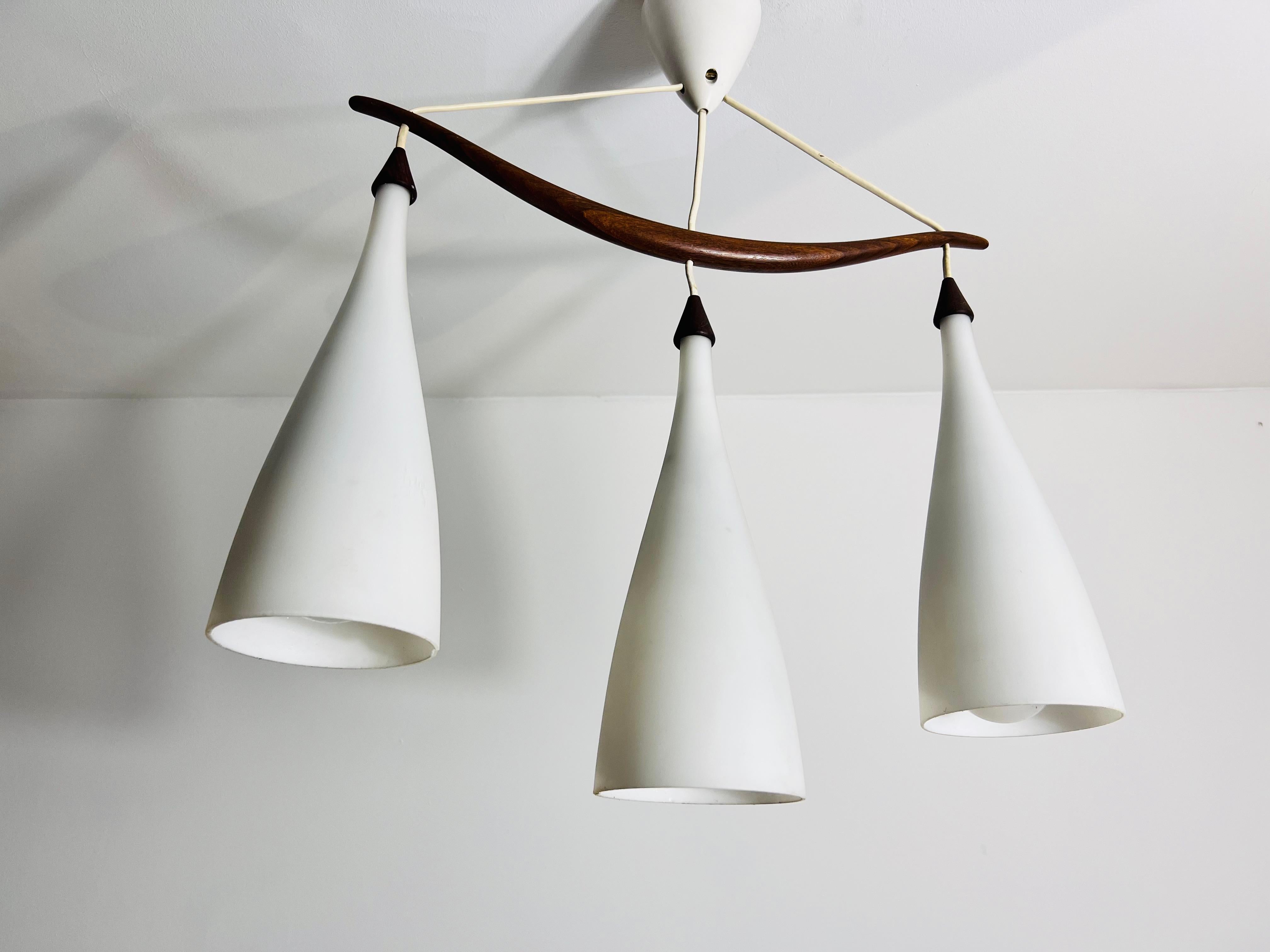 Teak and Opal Glass Pendant Lamp by Uno & Östen Kristiansson for Luxus Sweden In Good Condition For Sale In Hagenbach, DE