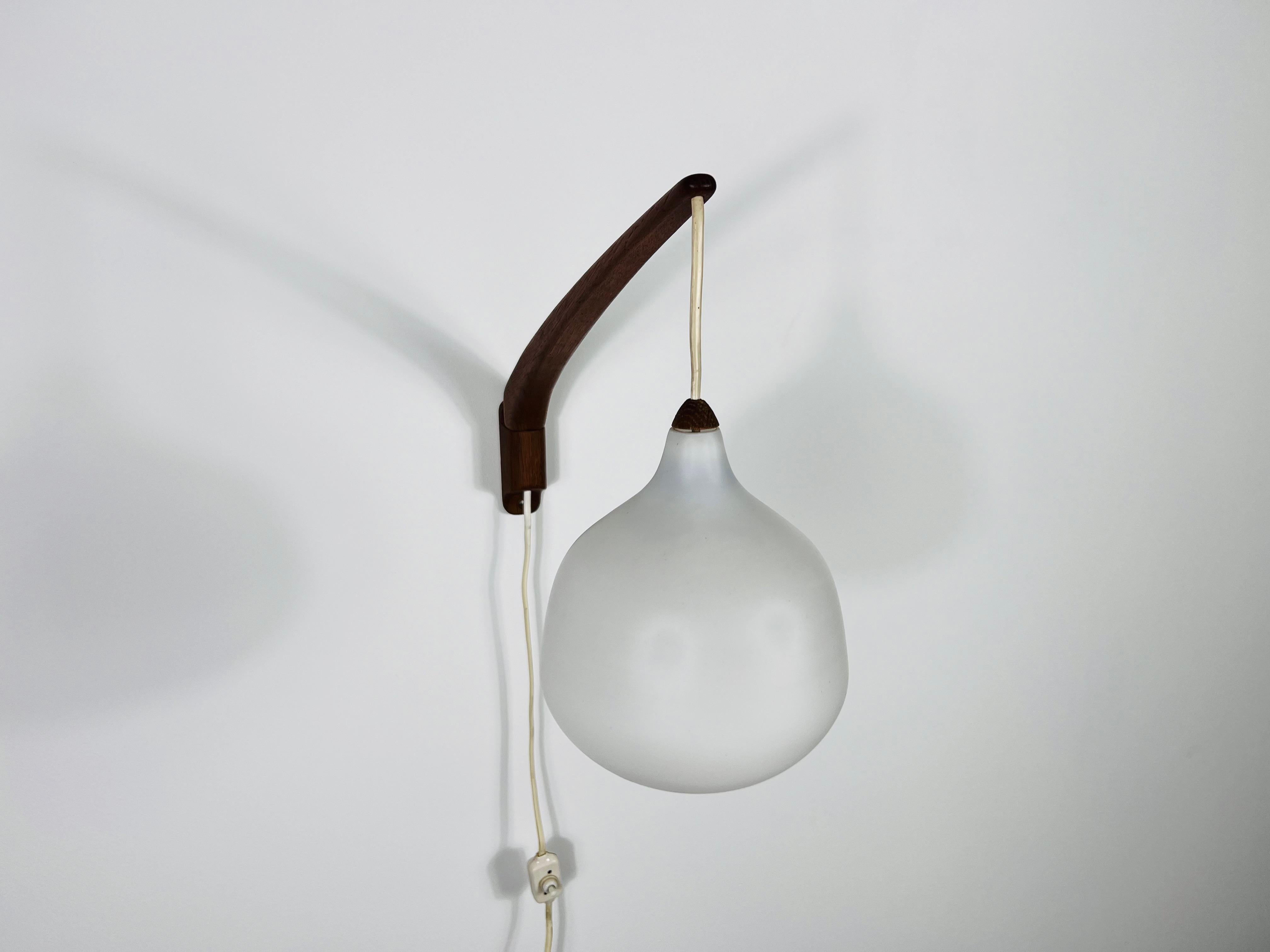 Mid-20th Century Teak and Opaline Glass Wall Lamp by Uno & Östen Kristiansson for Luxus Sweden For Sale