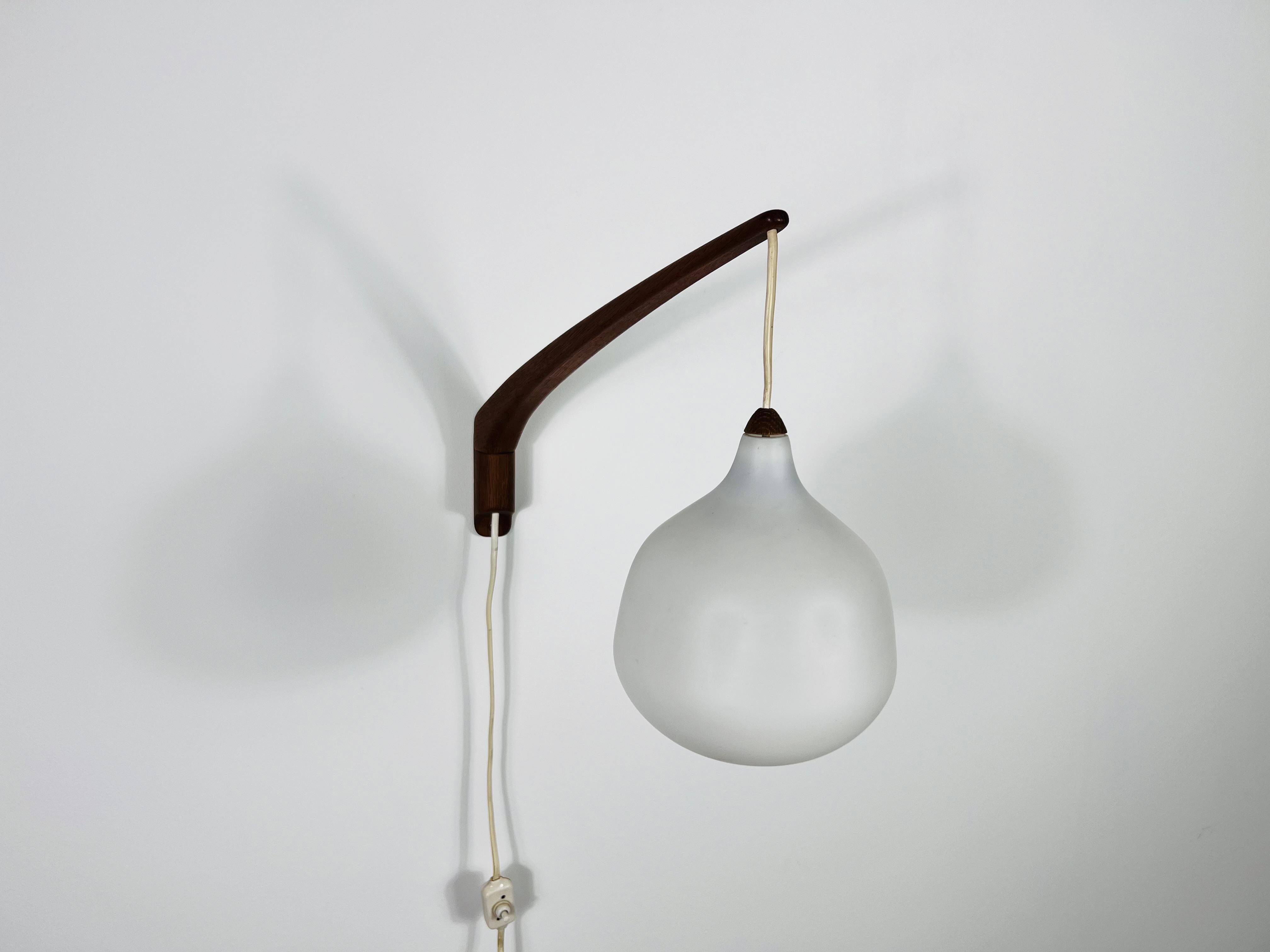 Teak and Opaline Glass Wall Lamp by Uno & Östen Kristiansson for Luxus Sweden For Sale 1