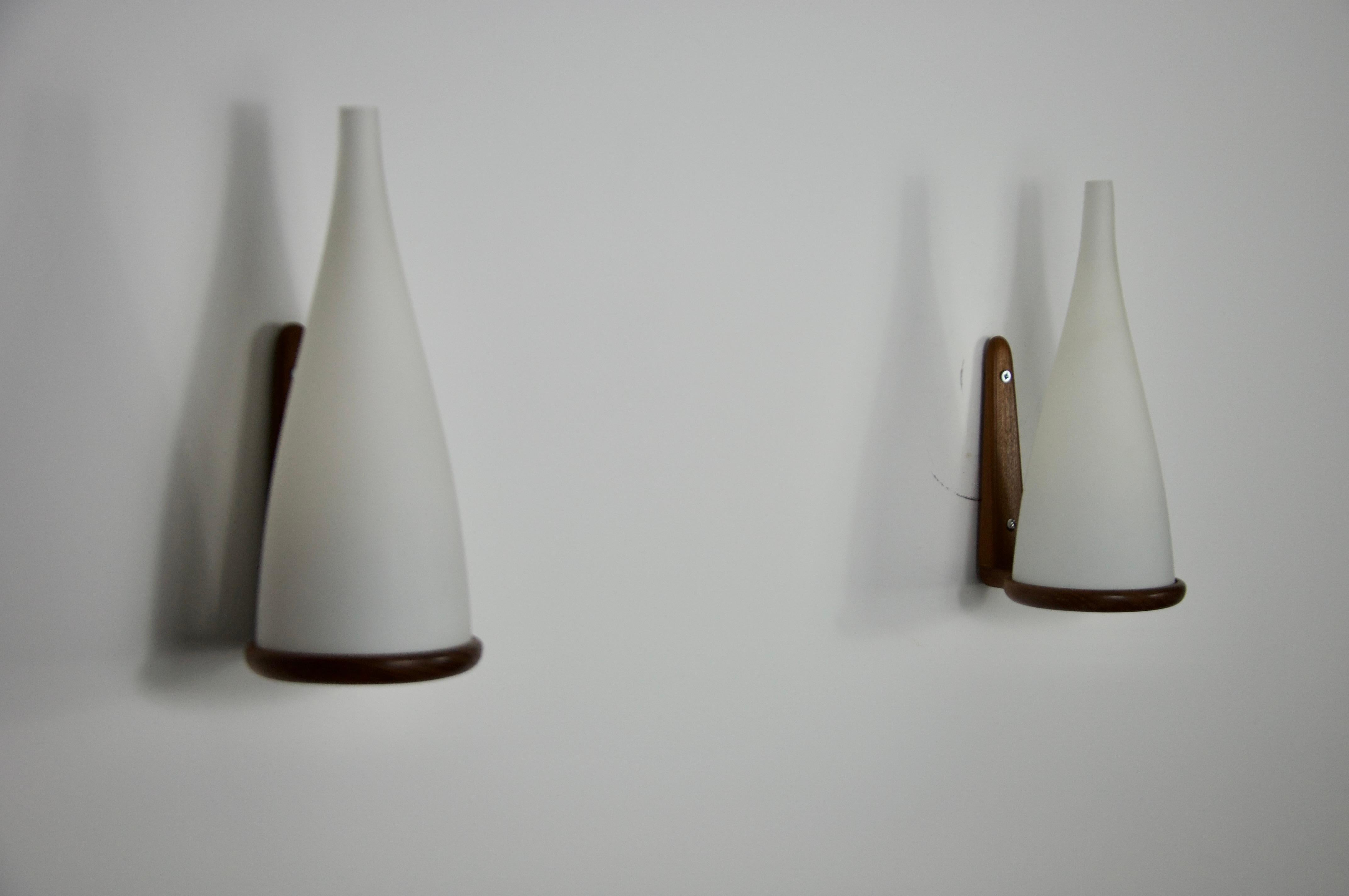 Mid-20th Century Teak and Opaline Glass Wall Lamps by Uno & Östen Kristiansson for Luxus Sweden For Sale