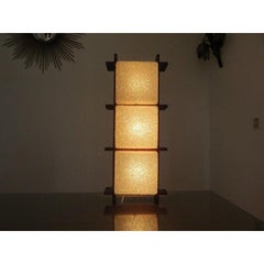 Teak and perpex wall light, illuminating with 4 lights, French work circa 1950