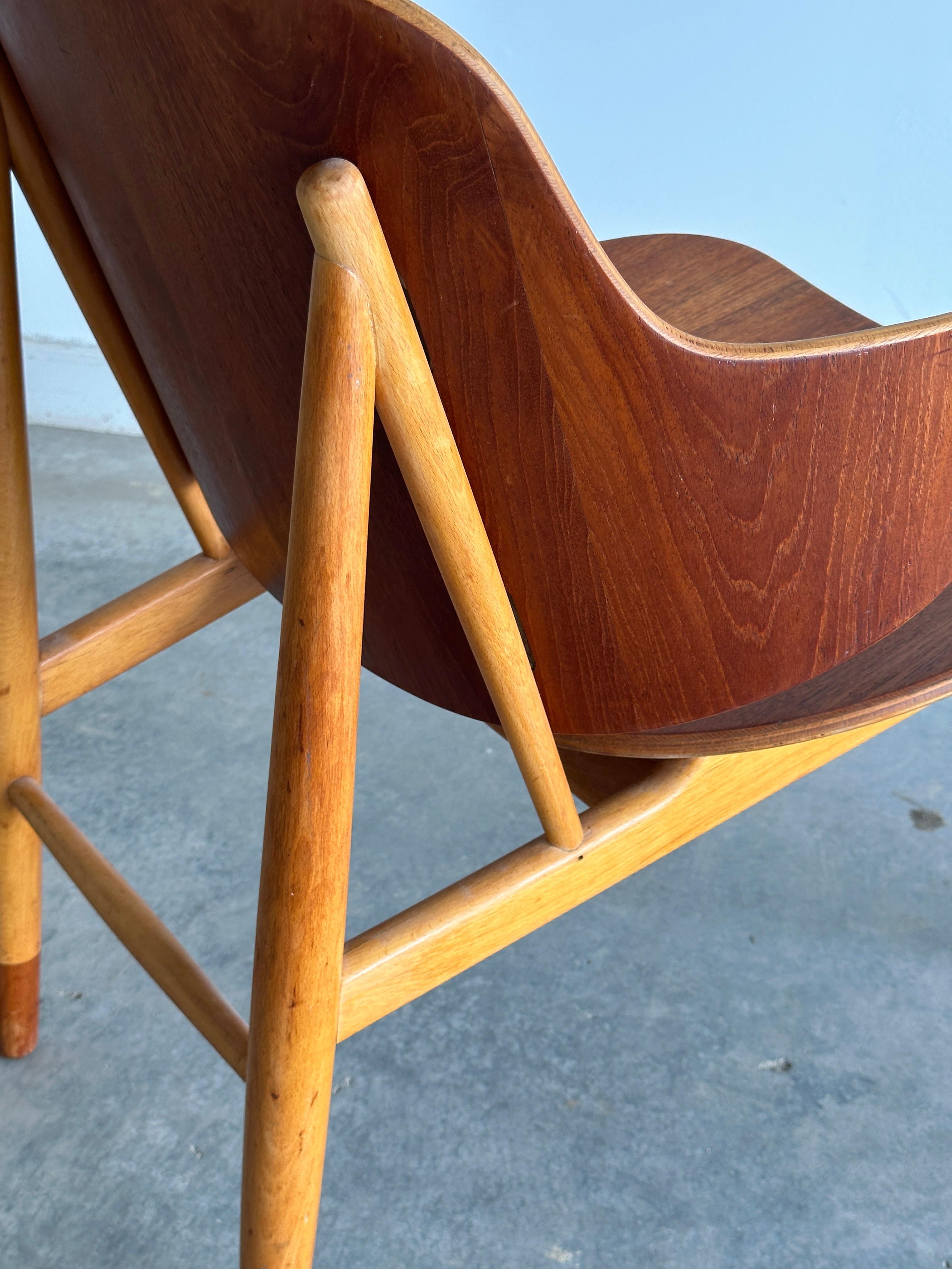 Scandinavian Modern Teak and walnut 'Penguin' chair by Ib Kofod-Larsen for Selig For Sale