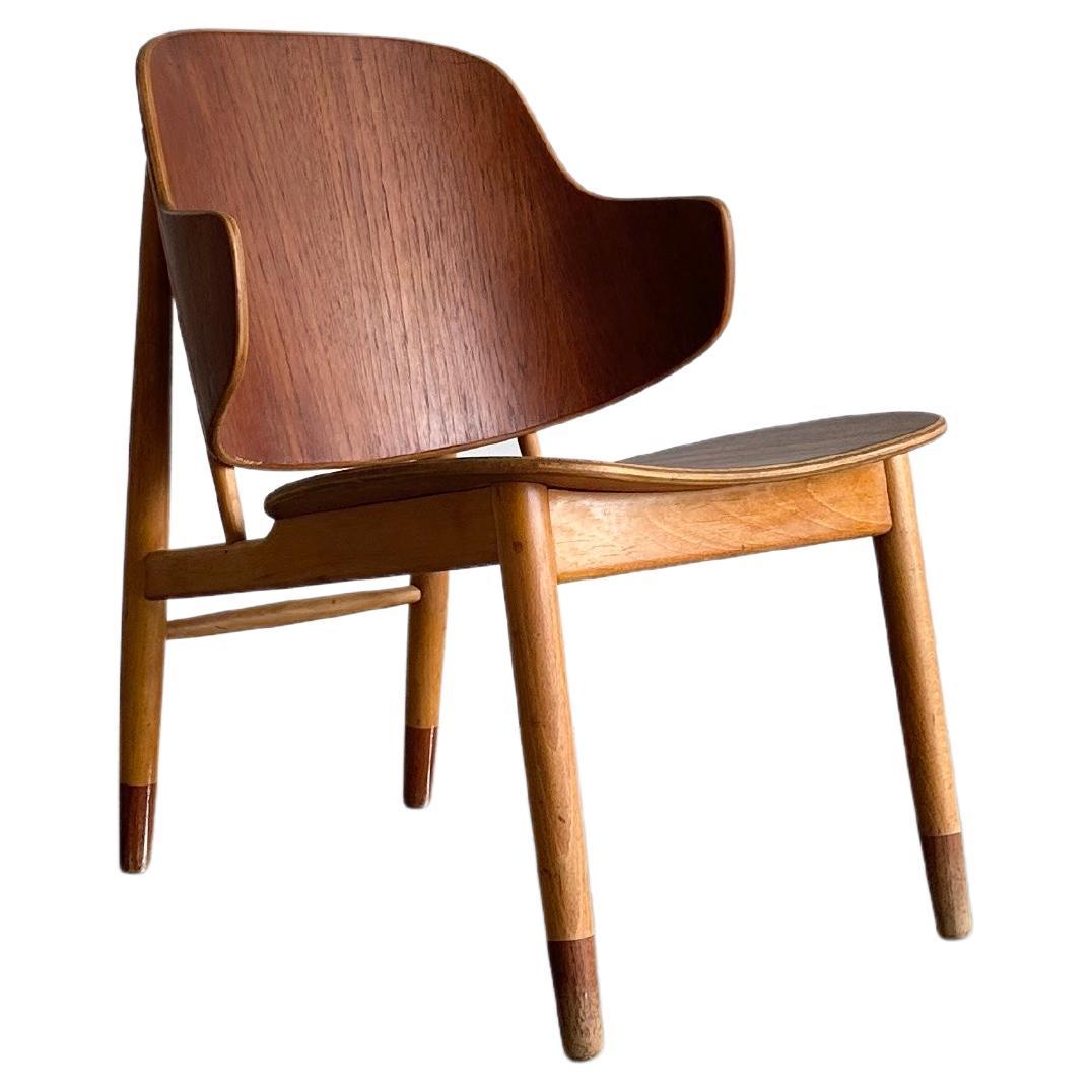 Teak and walnut 'Penguin' chair by Ib Kofod-Larsen for Selig