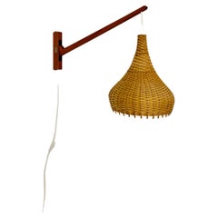 Lampada da parete in teak e vimini