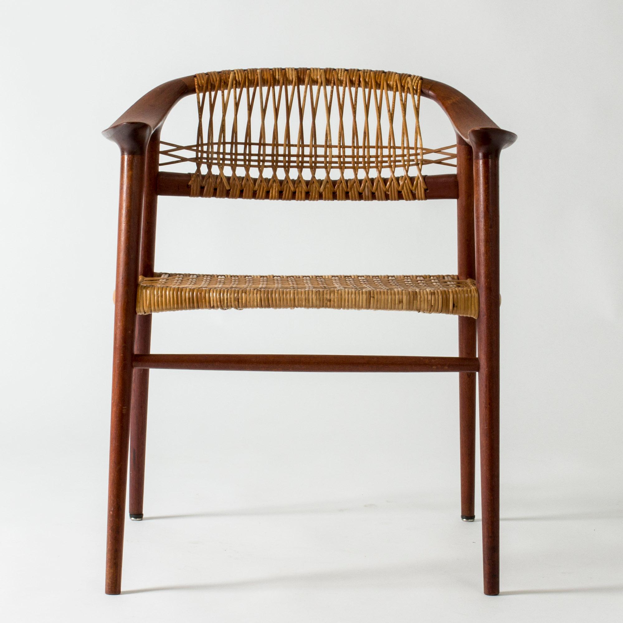 Beautiful teak armchair from Raastad & Reling, model called “Bambi”. Wreathed rattan seat and back. Curved, smooth lines, wonderful silhouette.