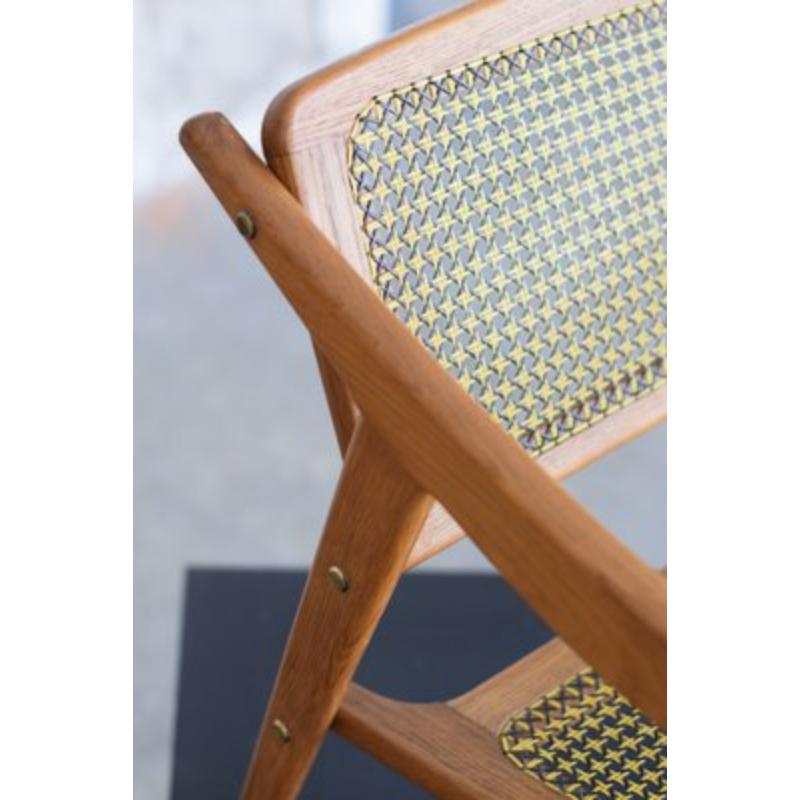 Teak Armchair by Michel Ducaroy for Sna, France, 1952
 
 Vintage Design
 In the 1950s, French designer Michel Ducaroy designed this elegant living room chair as part of his first collection for his own furniture company, SNA Roset. This chair
